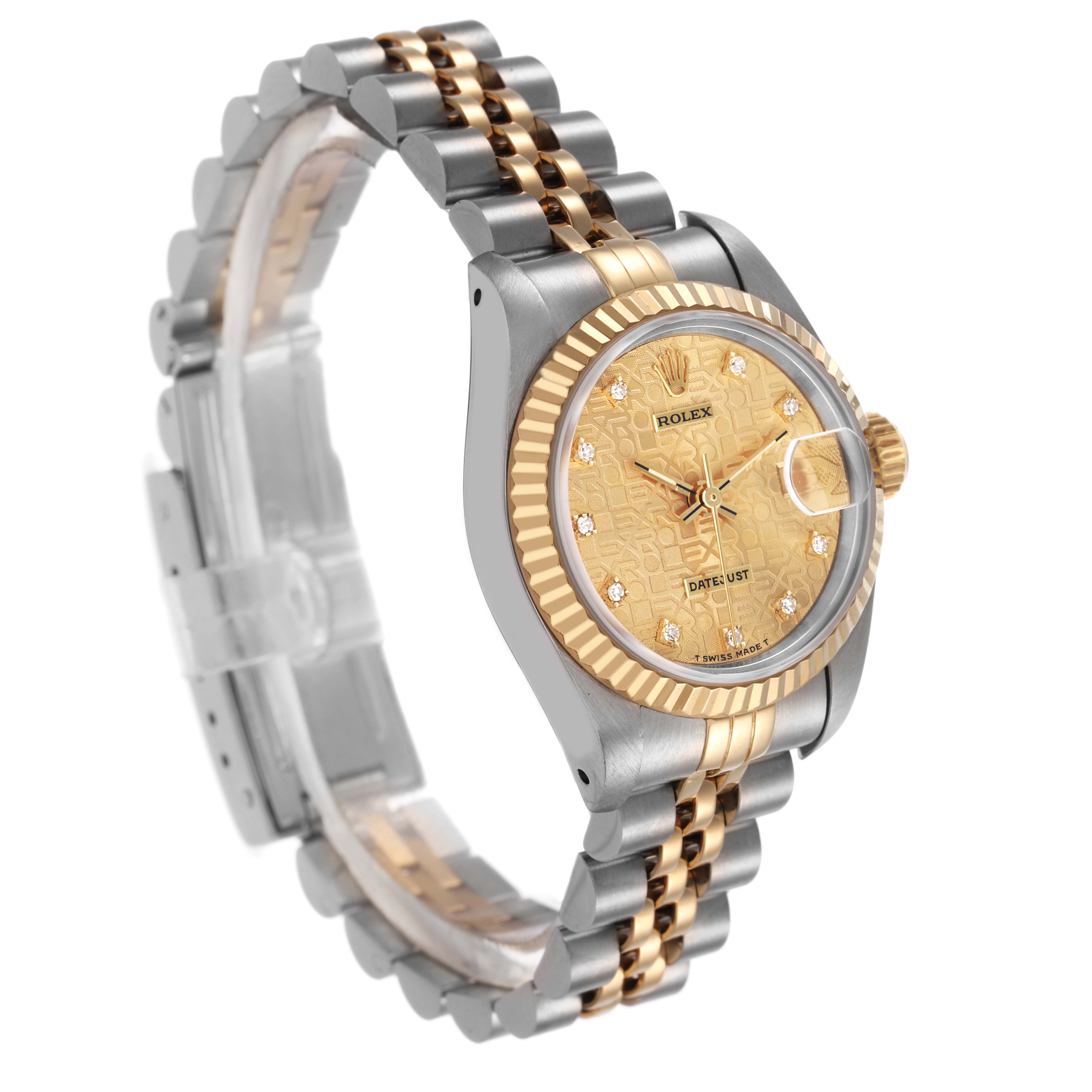 The Rolex Datejust 69173 Women's Steel and Gold (two tone) Champagne Dial watch is shown at a 3/4 angle, highlighting its gold bezel, patterned dial, and two-tone bracelet.