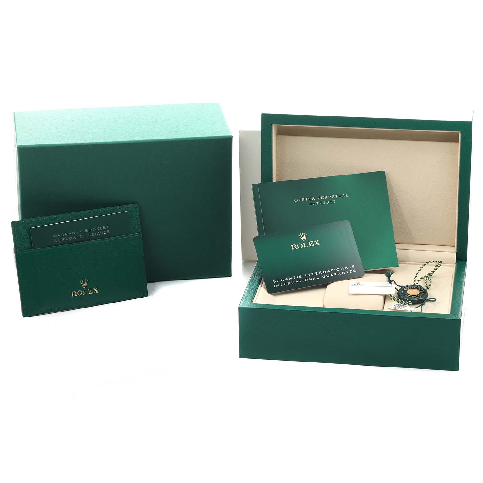 The image shows a green Rolex Datejust 278344 Women
s Stainless Steel Blue Dial box with warranty booklets and tags displayed.