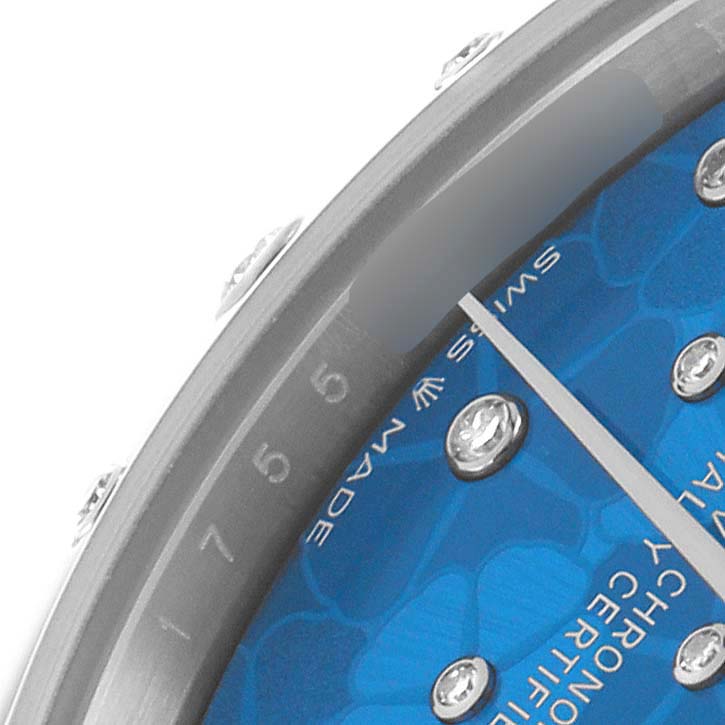The image shows a close-up of the dial and bezel of a Rolex Datejust 278344 Women
s Stainless Steel Blue Dial, focusing on the watch face and markers.