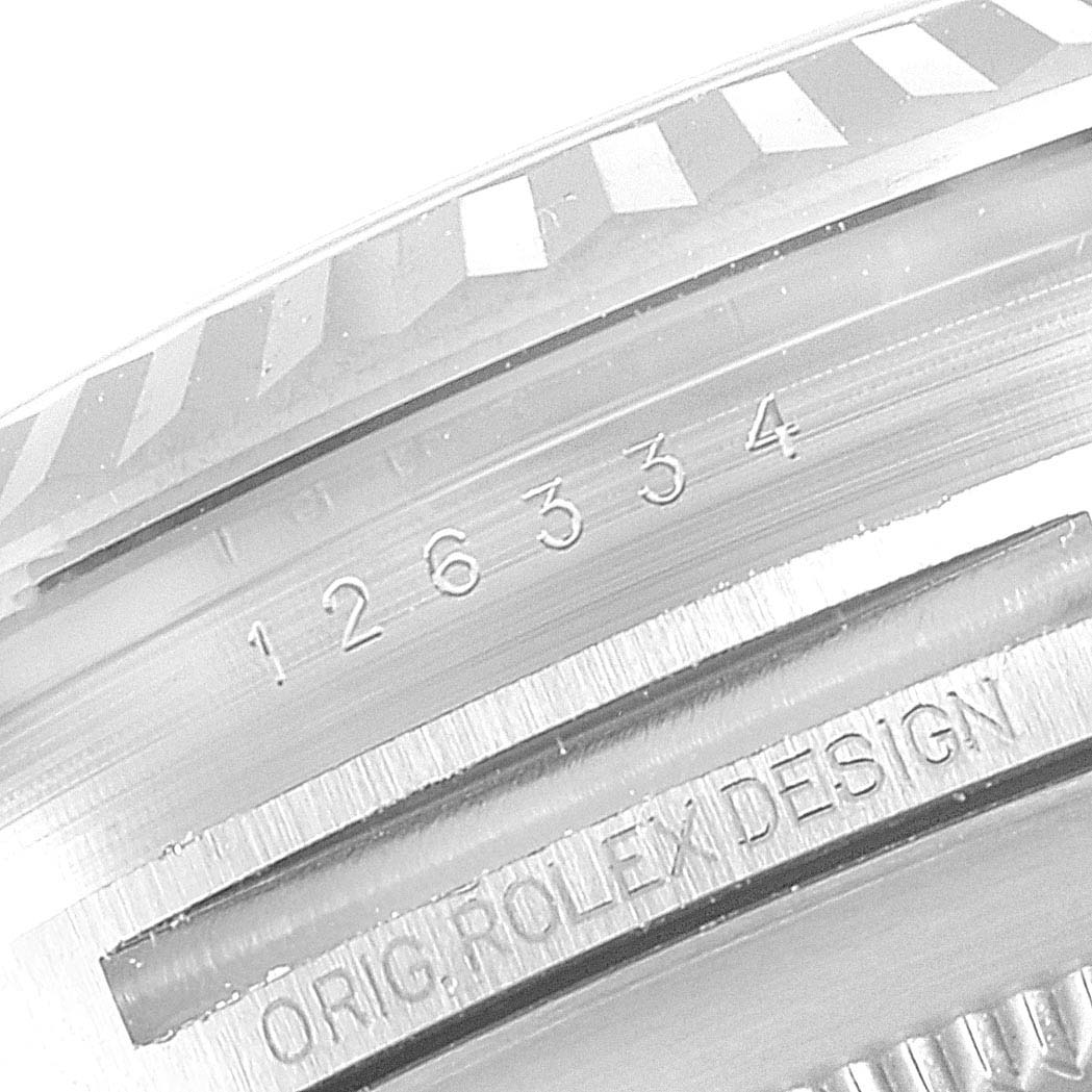 This image shows a close-up of the serial number and engraving on the bezel of the Rolex Datejust 41 126334 Men
s Stainless Steel Mother of Pearl Dial 126334 Men
s Stainless Steel Mother of Pearl Dial.