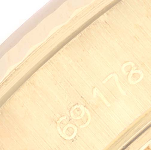 Close-up view of the inner case of a Rolex President 69178 Women's Yellow Gold Champagne Dial 69178 Women's Yellow Gold Champagne Dial watch, showing the model number "69178."