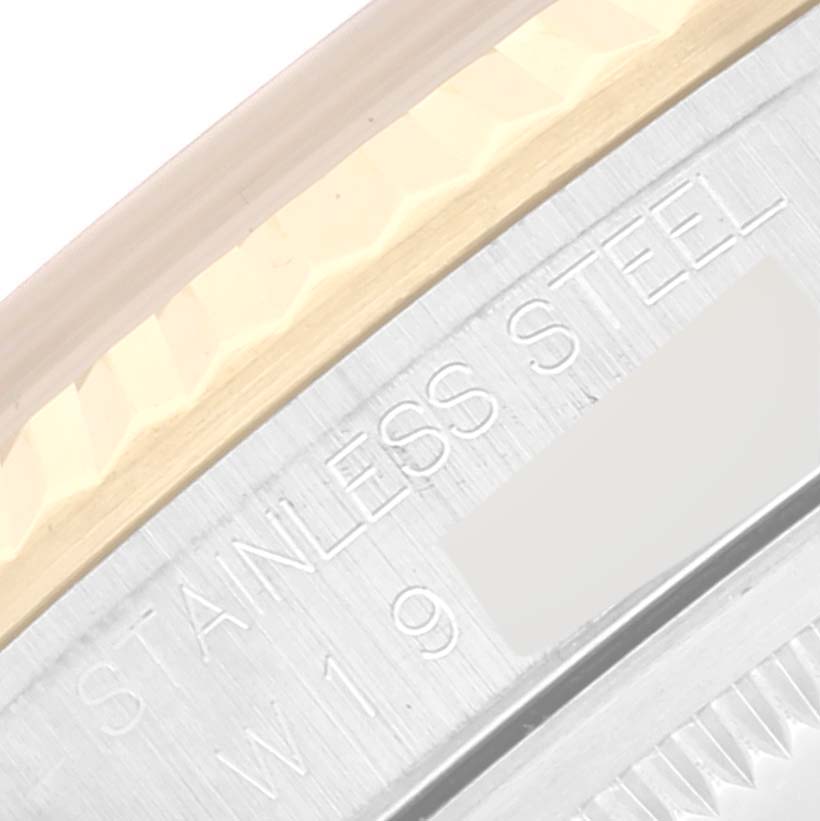 The image shows a close-up of the side bezel and case of a Rolex Datejust 16233 Men's Steel and Gold (two tone) Champagne Dial 16233 Men's Steel and Gold (two tone) Champagne Dial watch, featuring the words "STAINLESS STEEL".