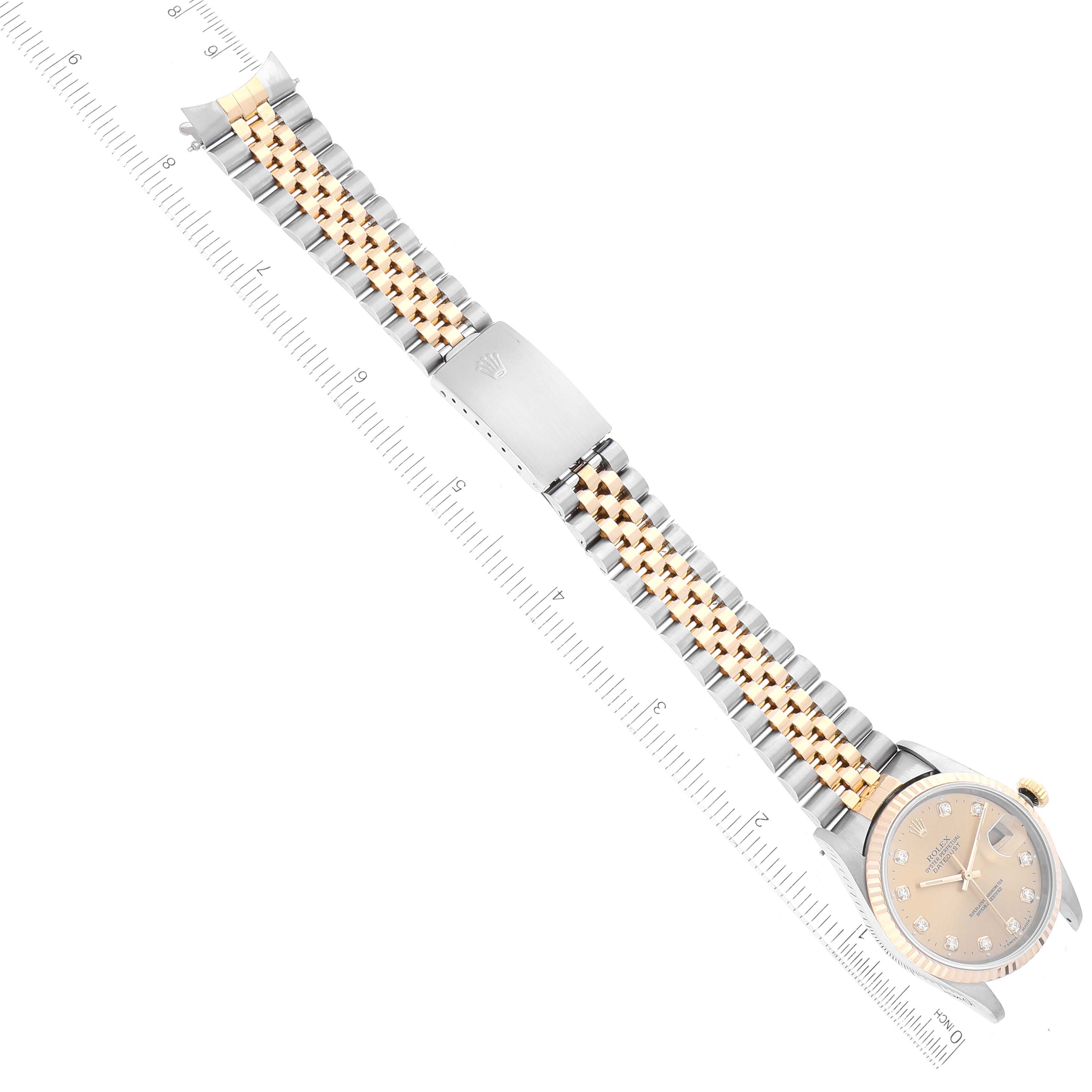 The image shows a Rolex Datejust 16233 Men's Steel and Gold (two tone) Champagne Dial 16233 Men's Steel and Gold (two tone) Champagne Dial watch from a top-down angle, highlighting its face and two-tone metal bracelet.