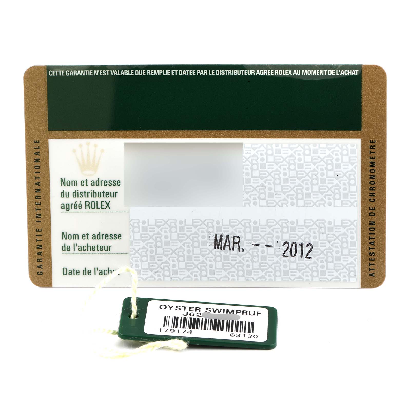 This image shows a warranty card and an Oyster Swimpruf tag for a Rolex Datejust 179174 Women's Stainless Steel Mother of Pearl Dial 179174 Women's Stainless Steel Mother of Pearl Dial watch.