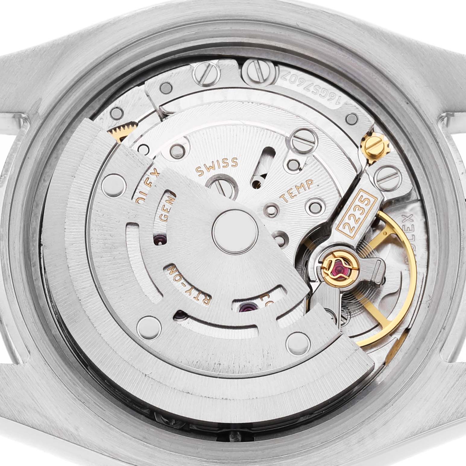 The image shows the movement of a Rolex Datejust 179174 Women's Stainless Steel Pink Dial, highlighting the intricate gears and components from the back.