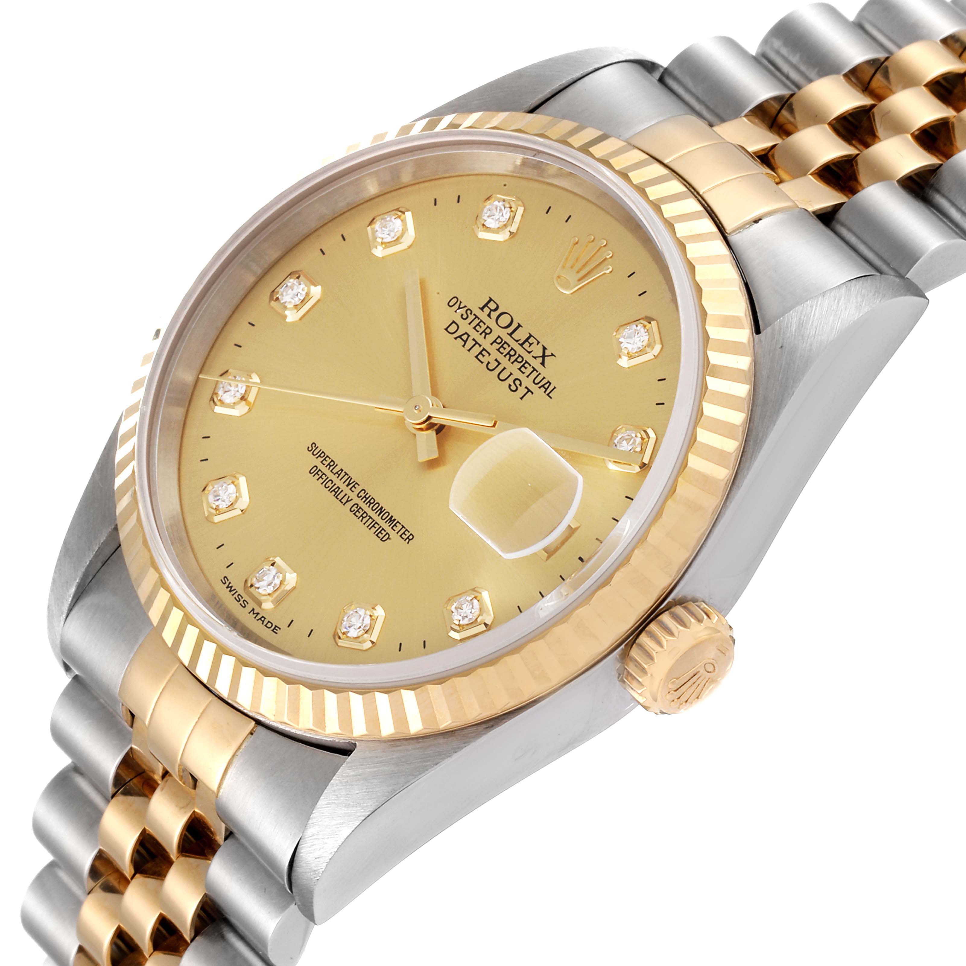 This image shows the face, bezel, crown, and bracelet of a Rolex Datejust 16233 Men's Steel and Gold (two tone) Champagne Dial 16233 Men's Steel and Gold (two tone) Champagne Dial watch taken from an angled top view.