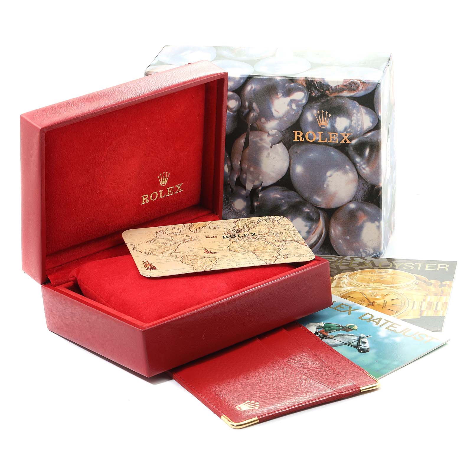 The image shows a red Rolex Datejust 69173 Women
s Steel and Gold (two tone) Champagne Dial 69173 Women
s Steel and Gold (two tone) Champagne Dial watch box with an open lid, a card, and accompanying booklets.