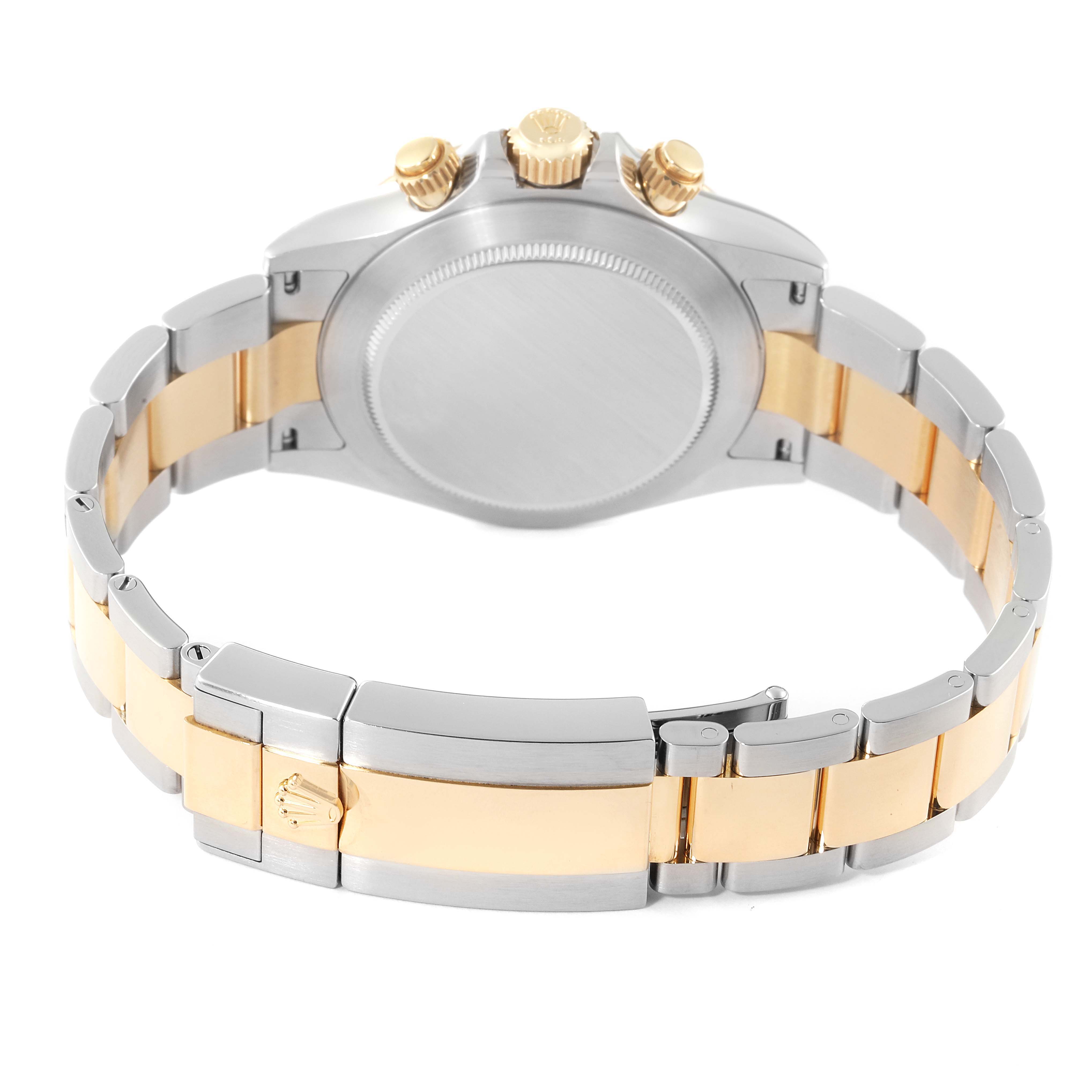 The image shows the back view of a Rolex Daytona 116523 Men's Steel and Gold (two tone) Mother of Pearl Dial 116523 Men's Steel and Gold (two tone) Mother of Pearl Dial watch, highlighting the bracelet and clasp.