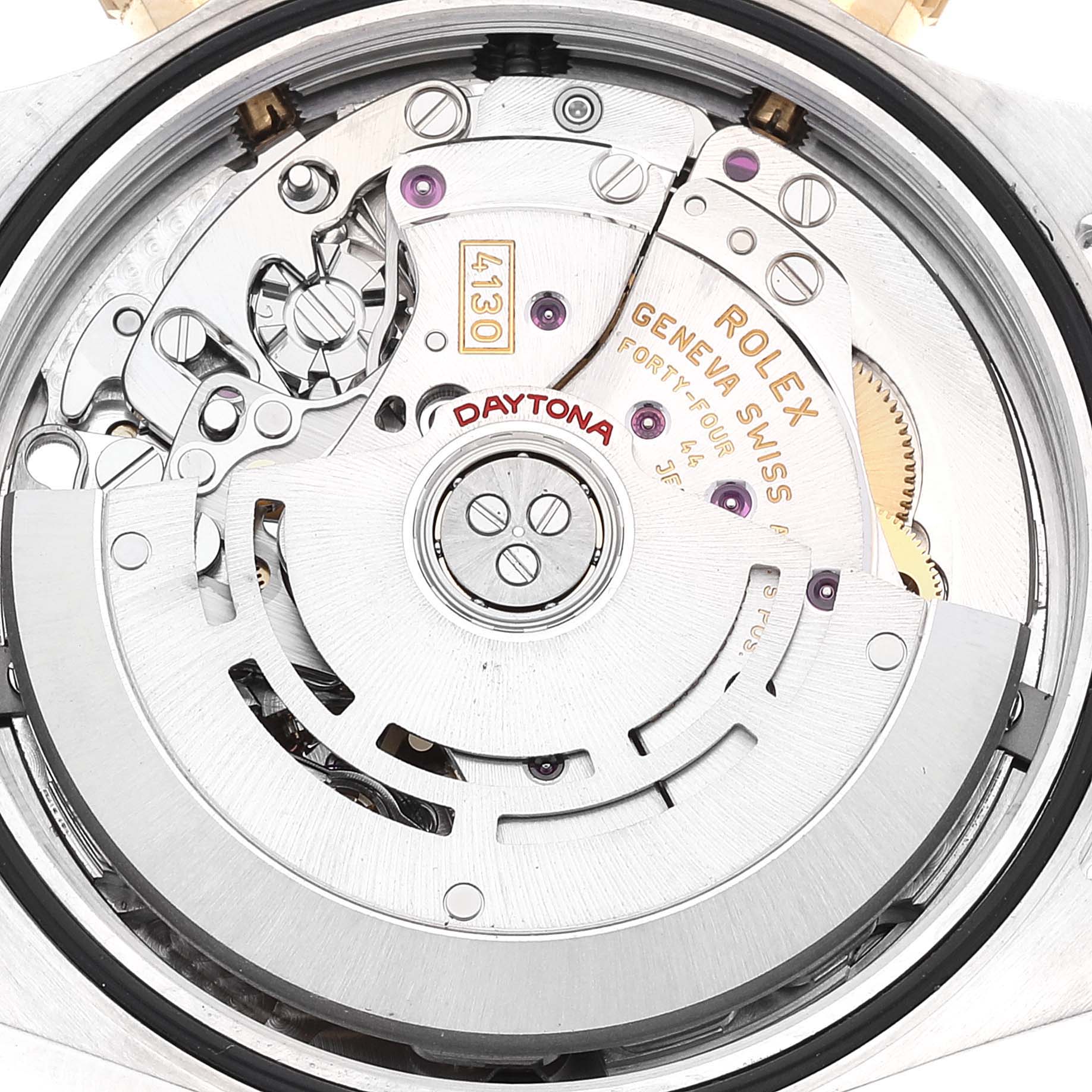 This image shows the inner workings and movement mechanism of a Rolex Daytona 116523 Men's Steel and Gold (two tone) Mother of Pearl Dial 116523 Men's Steel and Gold (two tone) Mother of Pearl Dial watch, focusing on the detailed components.