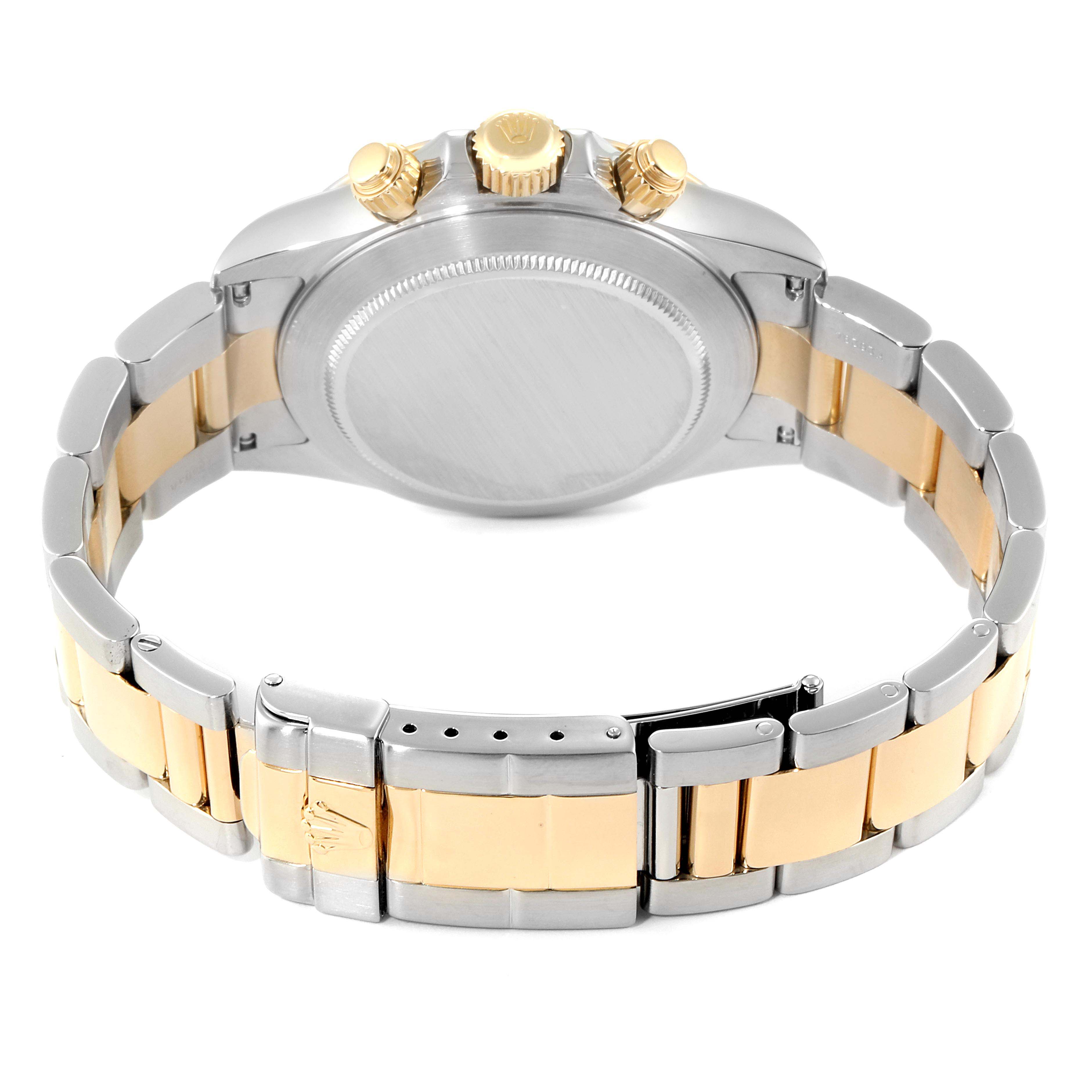 The image shows the back and side view of a Rolex Daytona 16523 Men
s Steel and Gold (two tone) White Dial 16523 Men
s Steel and Gold (two tone) White Dial watch, highlighting the bracelet and crown.