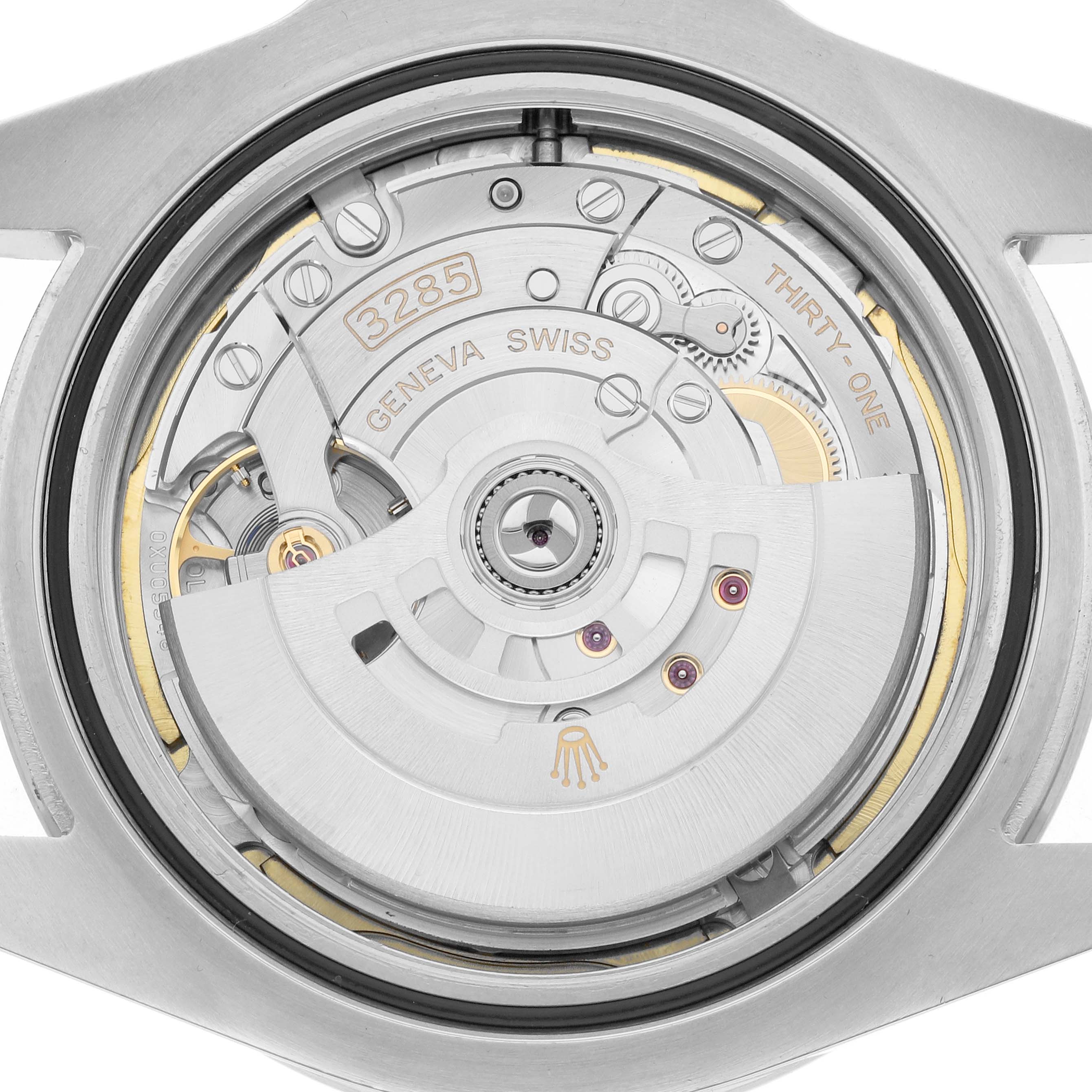 The image shows the back view of a Rolex Explorer 226570 Men
s Stainless Steel White Dial, highlighting its automatic movement and intricate mechanisms.