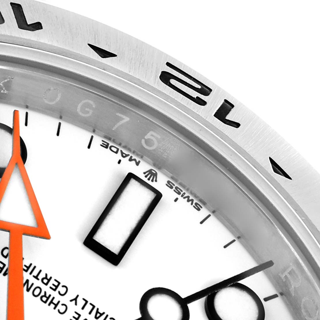 The image shows a close-up of the Rolex Explorer 226570 Men
s Stainless Steel White Dial watch, highlighting parts of the dial, bezel, and an orange hand.