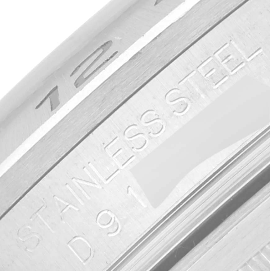 This image shows a close-up of the engraving on the stainless steel caseback of a Rolex Explorer 16570 Men's Stainless Steel Black Dial 16570 Men's Stainless Steel Black Dial watch.