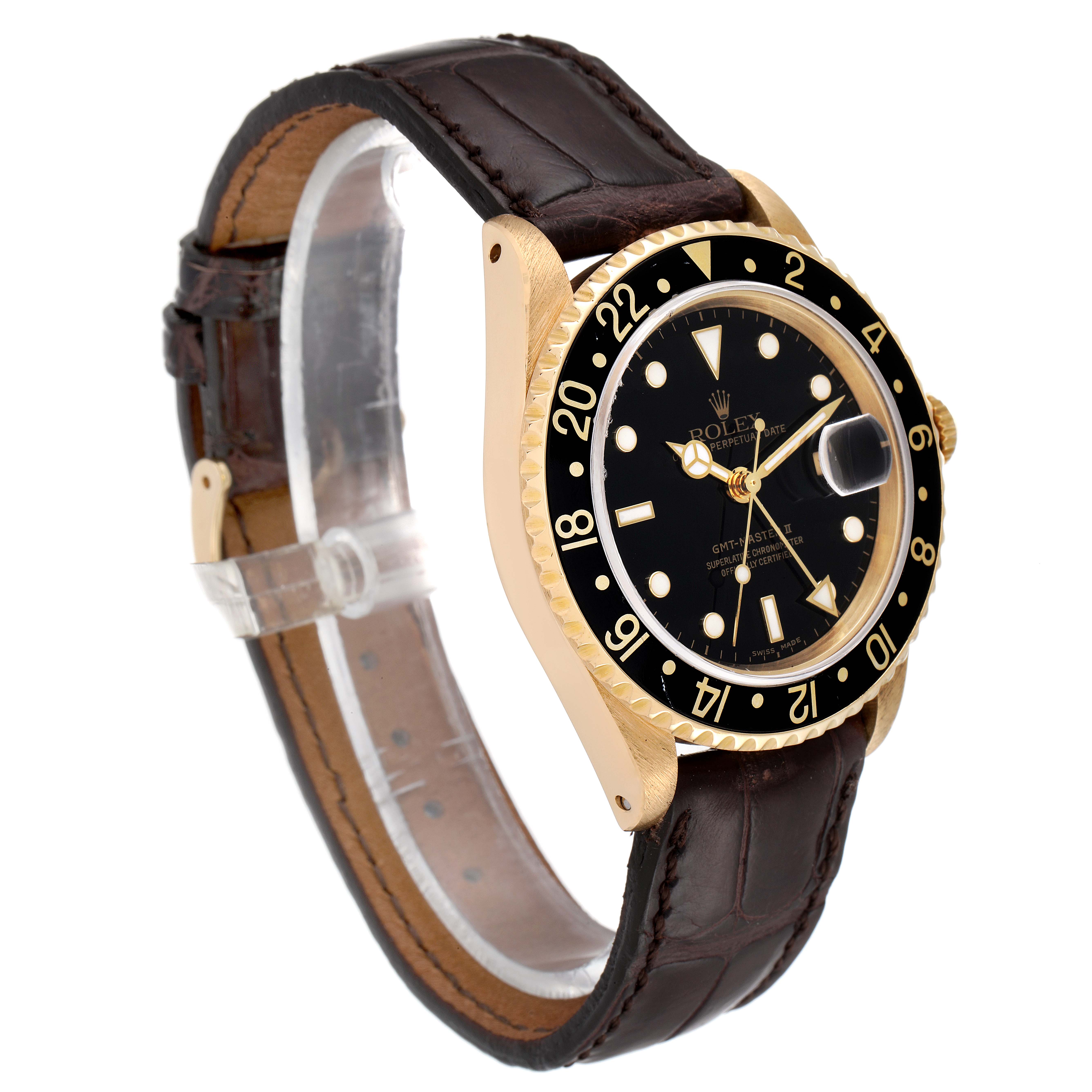 This image shows a Rolex GMT-Master 16718 Men
s Yellow Gold Black Dial 16718 Men
s Yellow Gold Black Dial model watch at an angled side view with a black dial, gold case, and brown leather strap.