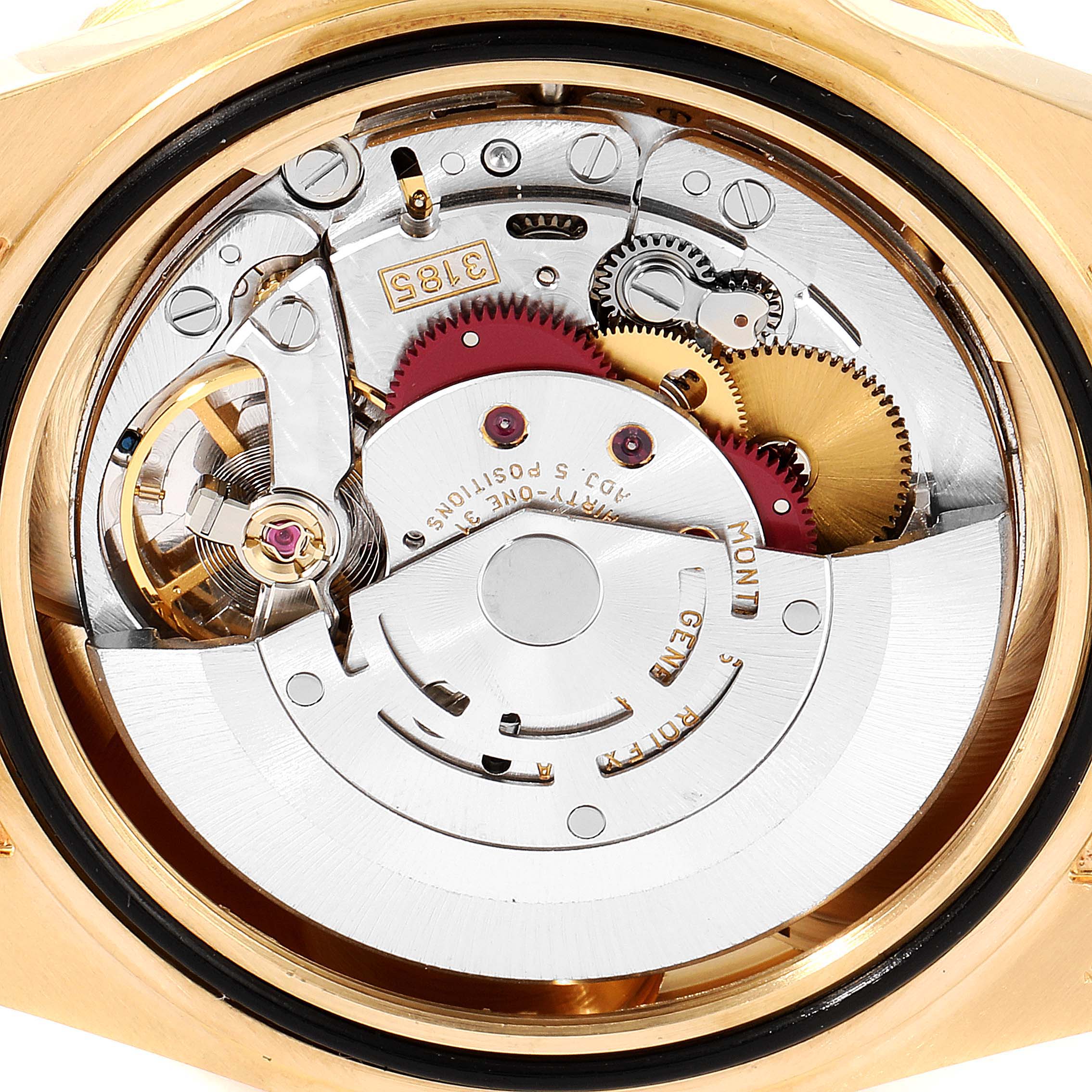 This image shows the internal movement mechanism of a Rolex GMT-Master 16718 Men
s Yellow Gold Black Dial 16718 Men
s Yellow Gold Black Dial watch from a top-down angle.