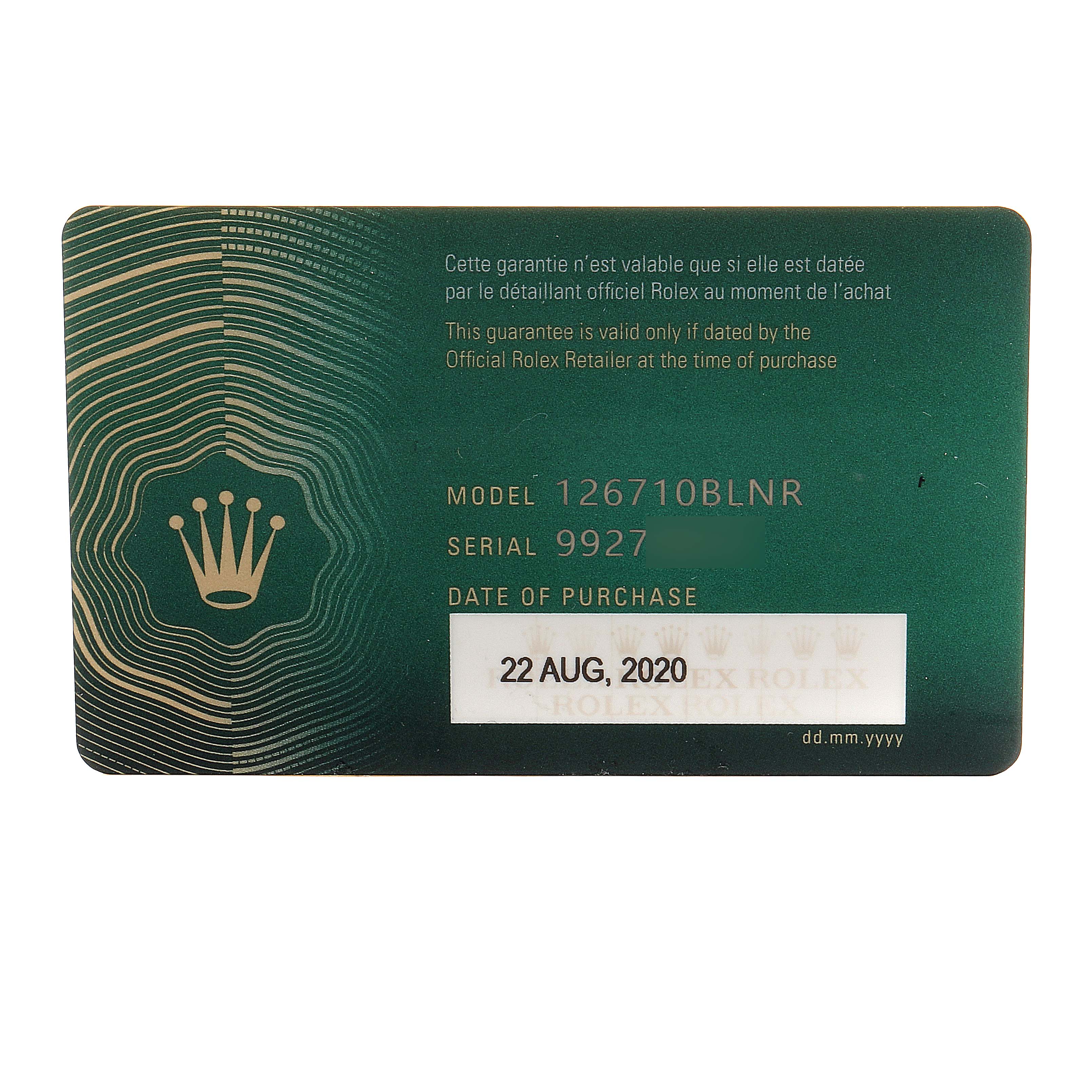 This image shows a Rolex warranty card for the GMT-Master model 126710BLNR, angled front-facing, displaying the serial number and purchase date.