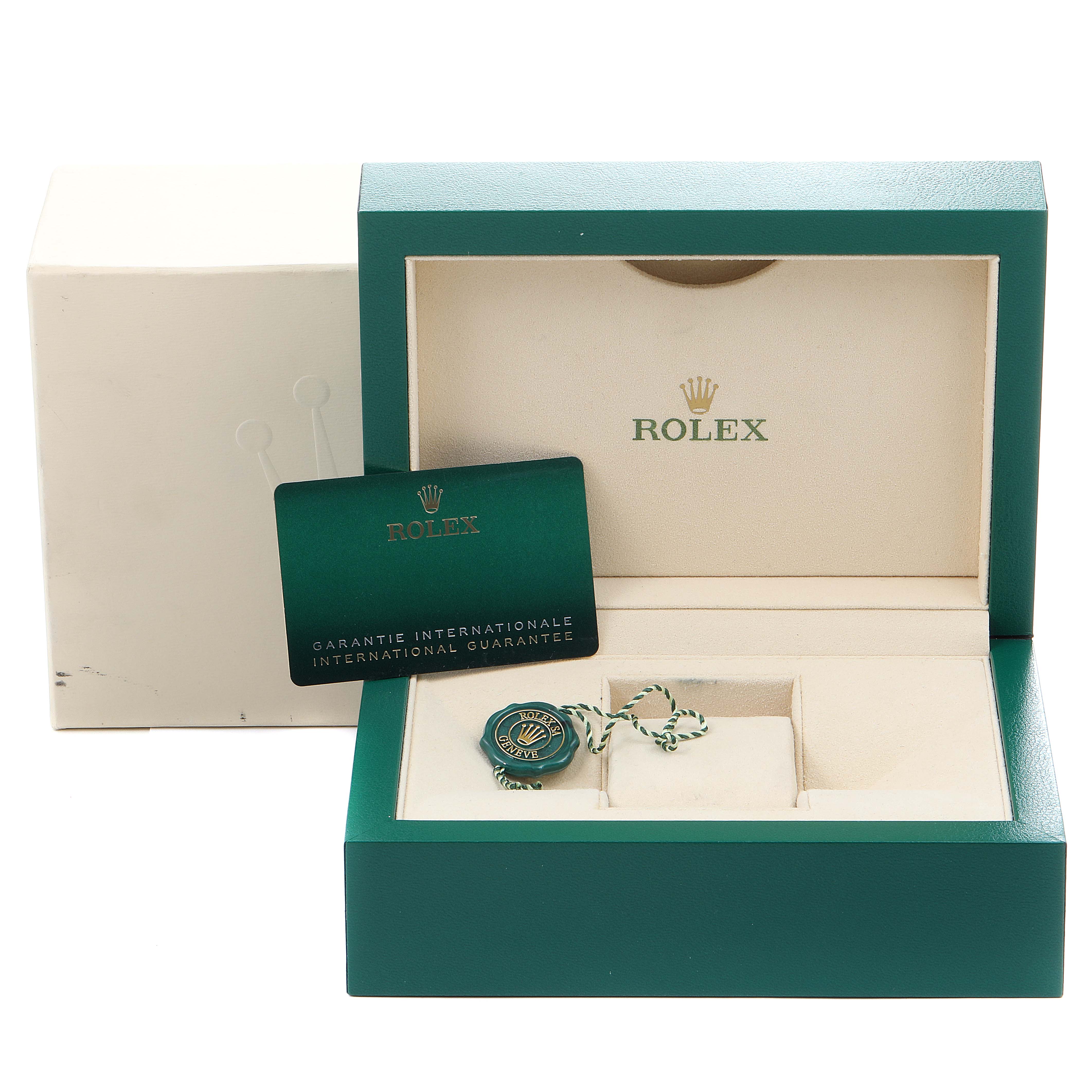 The image shows the packaging, international guarantee card, and hang tag for a Rolex GMT-Master 126710 Men
s Stainless Steel Black Dial 126710 Men
s Stainless Steel Black Dial watch.
