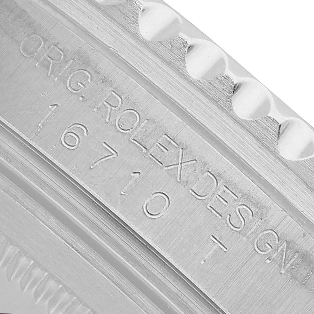 The image shows a close-up of the case engraving on a Rolex GMT-Master 16710 T Men's Stainless Steel Black Dial, model number 16710.