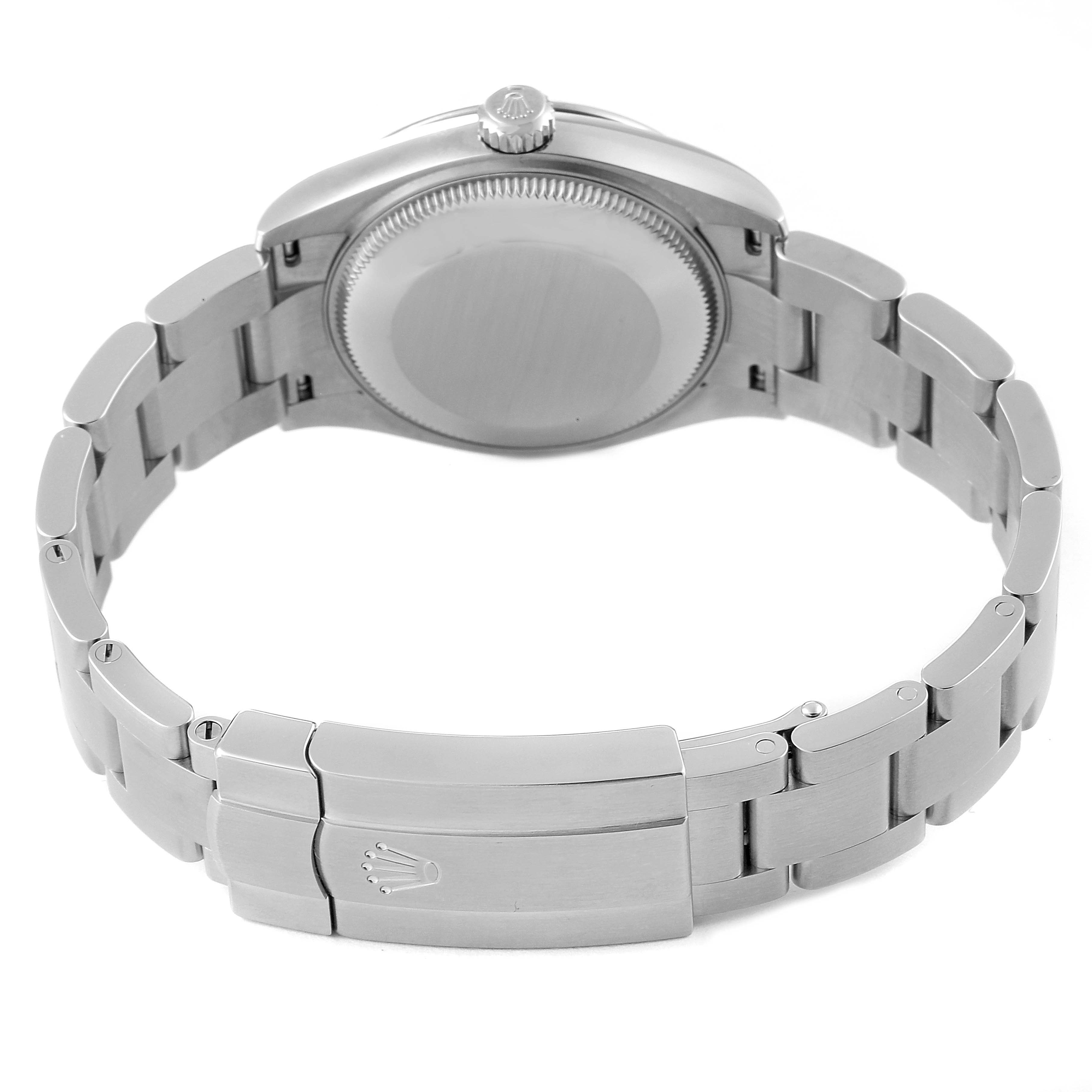 The image shows the back view of a Rolex Mid-Size 277200 Women's Stainless Steel Black Dial 277200 Women's Stainless Steel Black Dial model, highlighting its caseback, bracelet, and folding clasp.