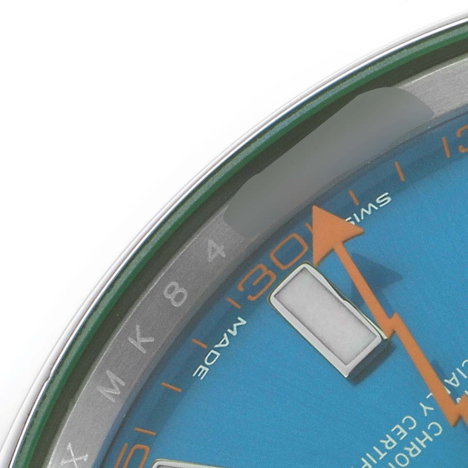 The image shows a close-up view of the dial and hour marker of a Rolex Milgauss 116400 Men's Stainless Steel Blue Dial watch, highlighting the second hand and part of the minute track.