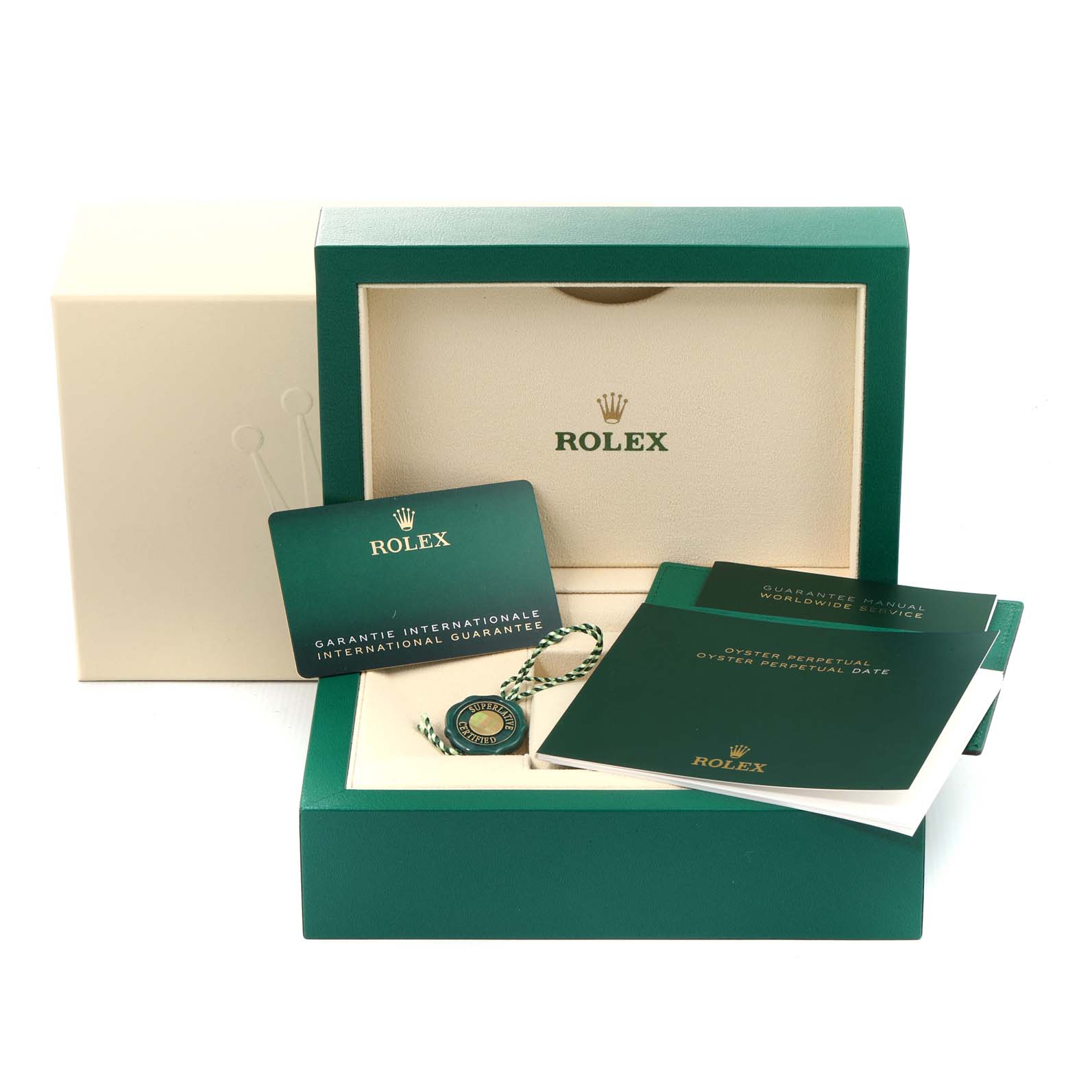 The image shows the packaging and accessories for a Rolex Oyster Perpetual 124300 Men's Stainless Steel Silver Dial 124300 Men's Stainless Steel Silver Dial, including the box, manuals, guarantee card, and tag.