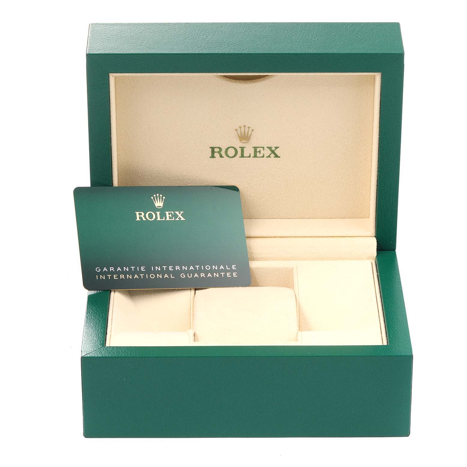 The image shows the open box and international guarantee card for a Rolex Oyster Perpetual 276200 Women
s Stainless Steel Pink Dial 276200 Women
s Stainless Steel Pink Dial watch.