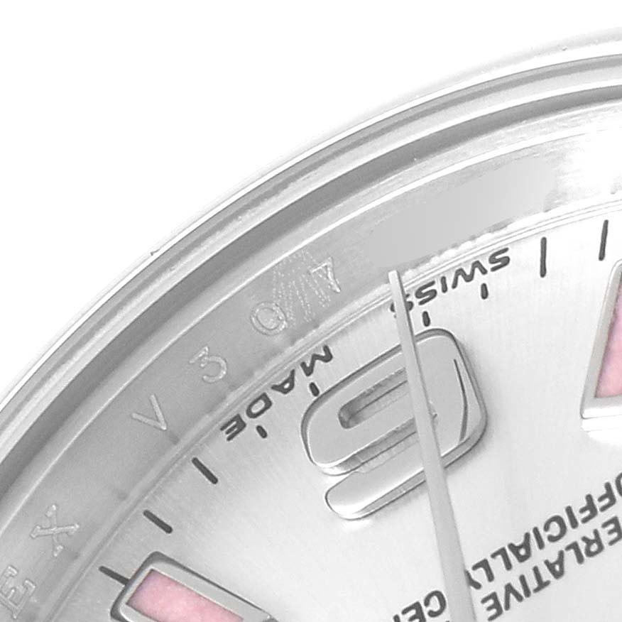 The image shows a close-up of the dial of the Rolex Oyster Perpetual 176200 Women's Stainless Steel Silver Dial 176200 Women's Stainless Steel Silver Dial watch, focusing on the edge, part of the nine o'clock marker, and surrounding text.