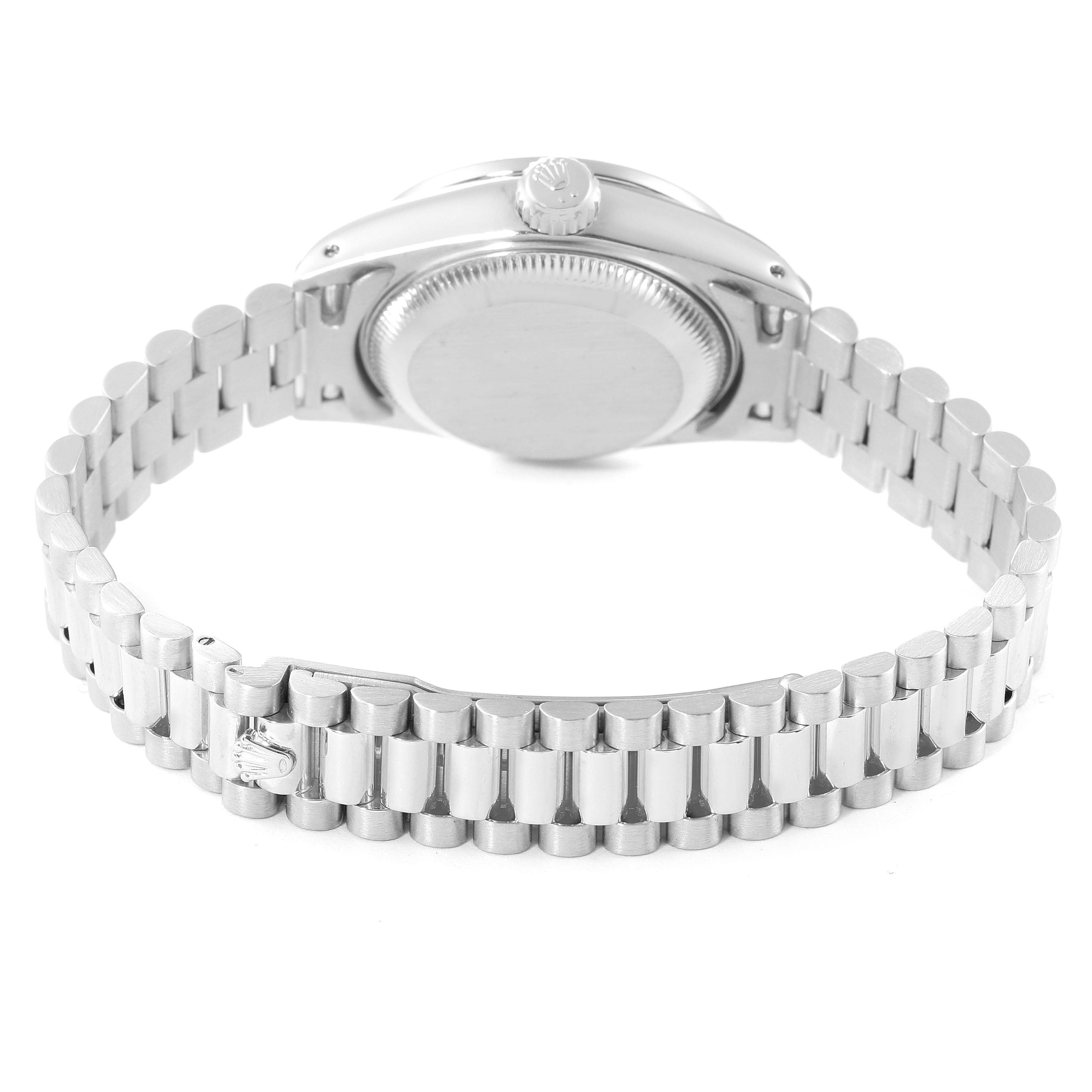 The image shows the back view of a Rolex President 69139 Women
s White Gold Silver Dial 69139 Women
s White Gold Silver Dial model, focusing on the case back and the bracelet.