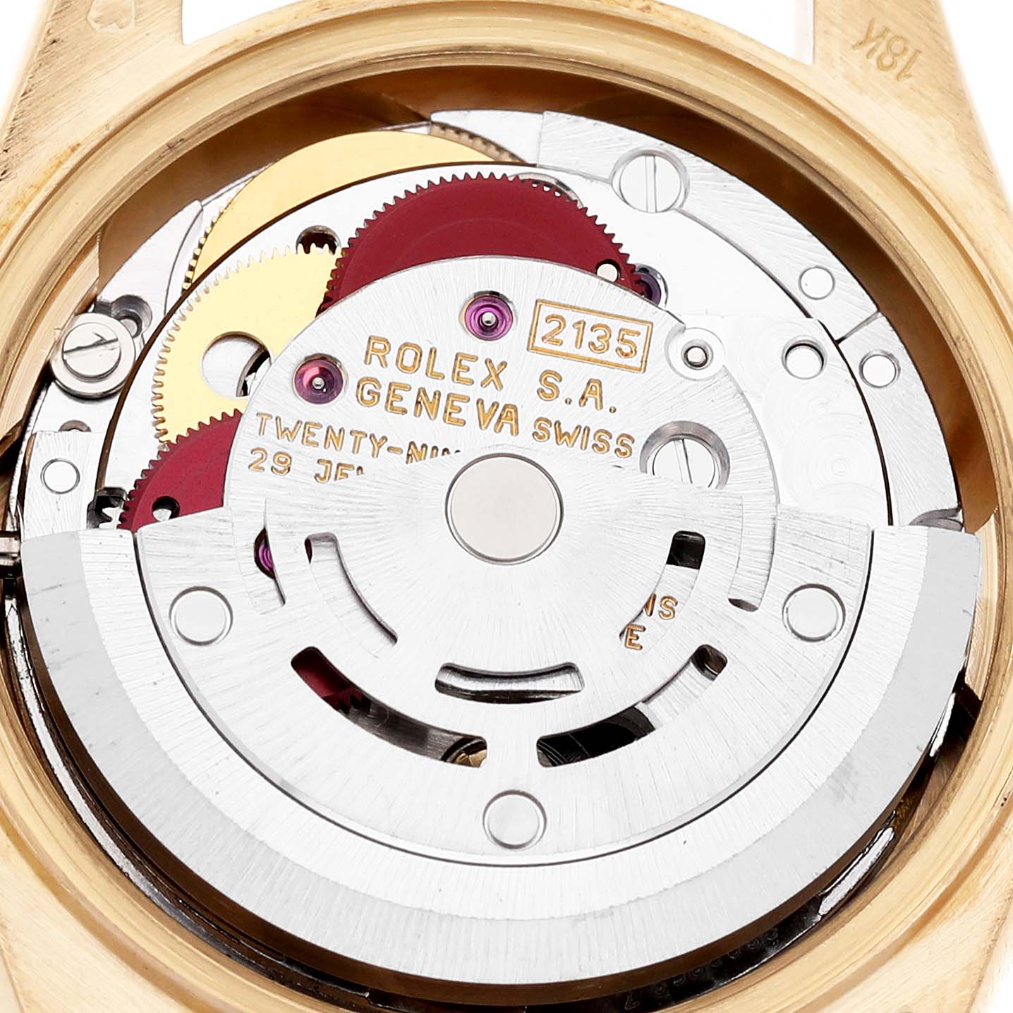 The image shows the movement of the Rolex President 69278 Women's Yellow Gold White Dial model, viewed from the back, revealing gears and inscriptions.