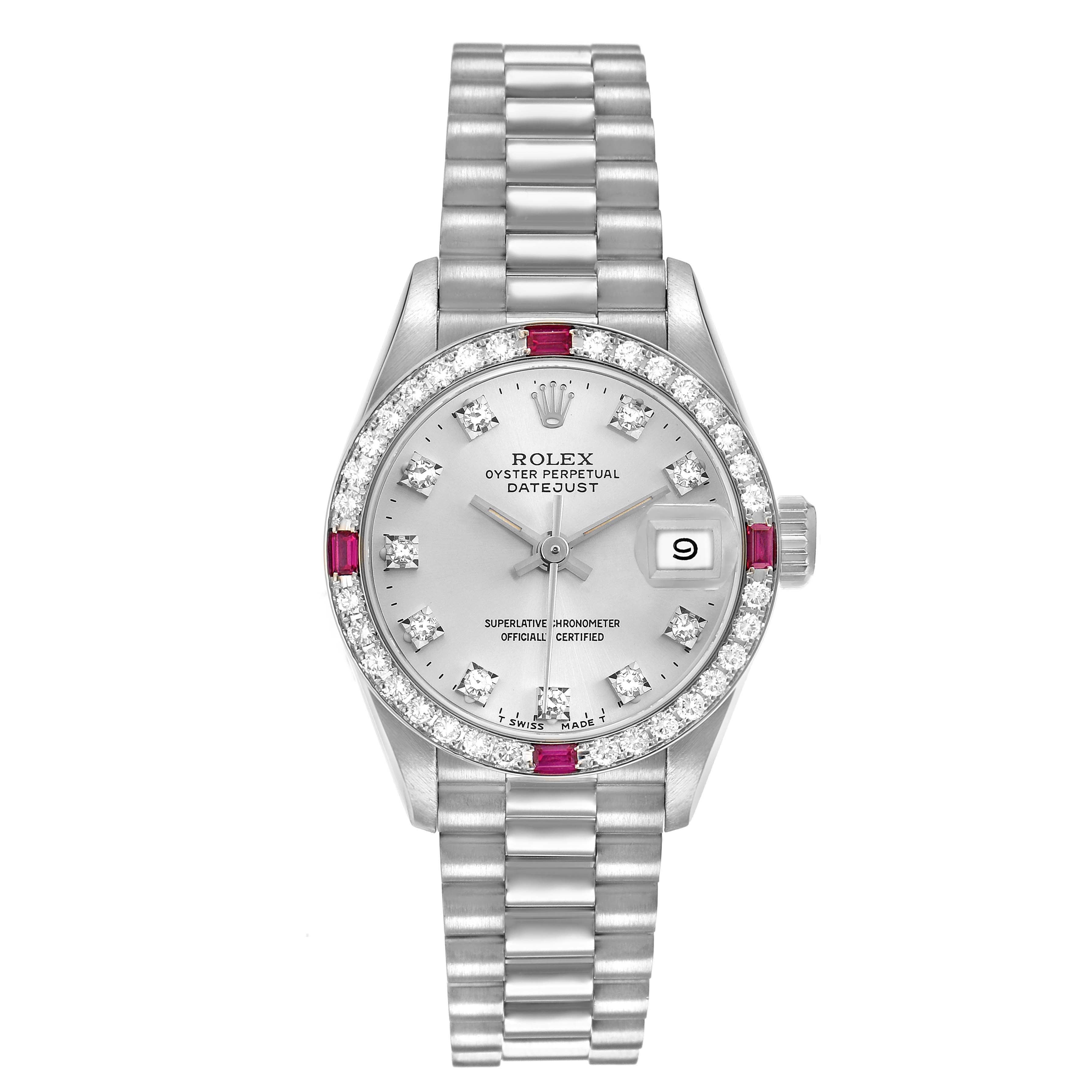 The Rolex President 69069 Women's White Gold Silver Dial watch is shown from a top-down angle, highlighting its face, bezel, bracelet, and date display.