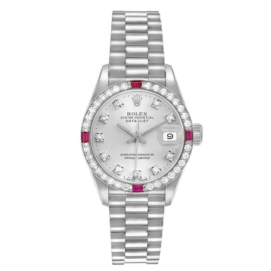 The Rolex President 69069 Women's White Gold Silver Dial watch is shown from a top-down angle, highlighting its face, bezel, bracelet, and date display.