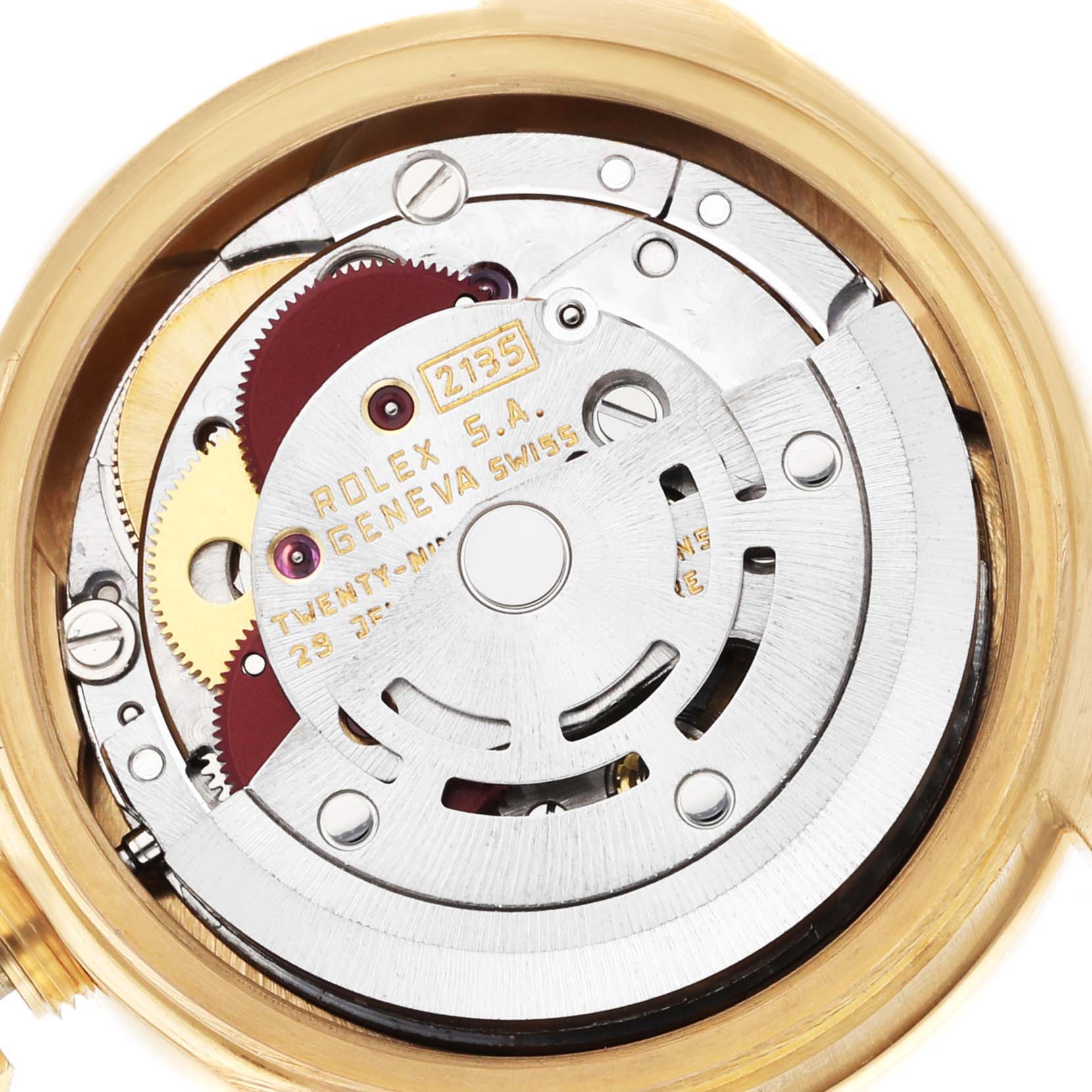 The image shows an internal view of the Rolex President 69068 Women
s Yellow Gold Champagne Dial watch movement, highlighting gears and rotor.