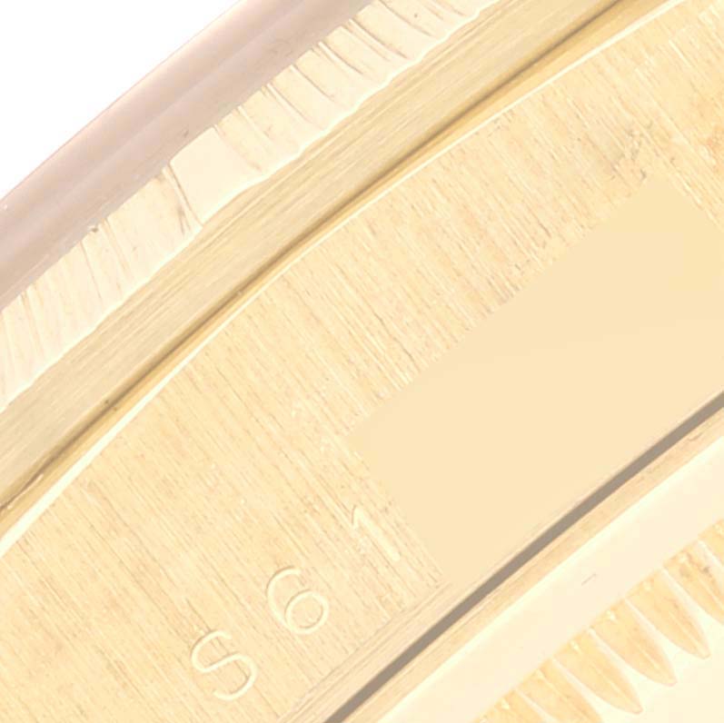 This close-up image shows the side view of the bezel and case edge of a Rolex President 18248 Men's Yellow Gold Champagne Dial 18248 Men's Yellow Gold Champagne Dial model watch.
