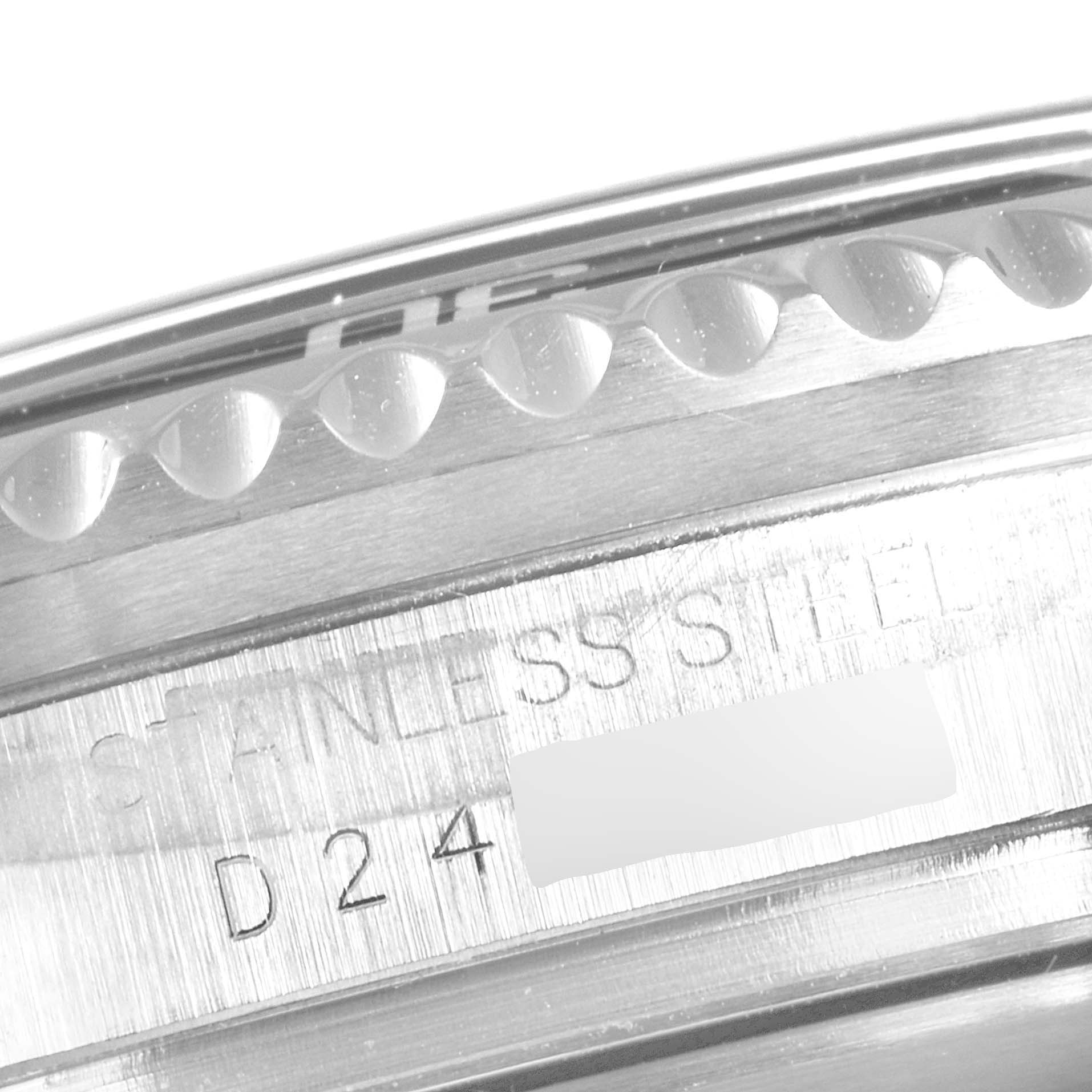 This image shows a close-up of the bezel and side engraving of a Rolex Submariner 16600 Men
s Stainless Steel Black Dial 16600 Men
s Stainless Steel Black Dial watch, highlighting the stainless steel marking.