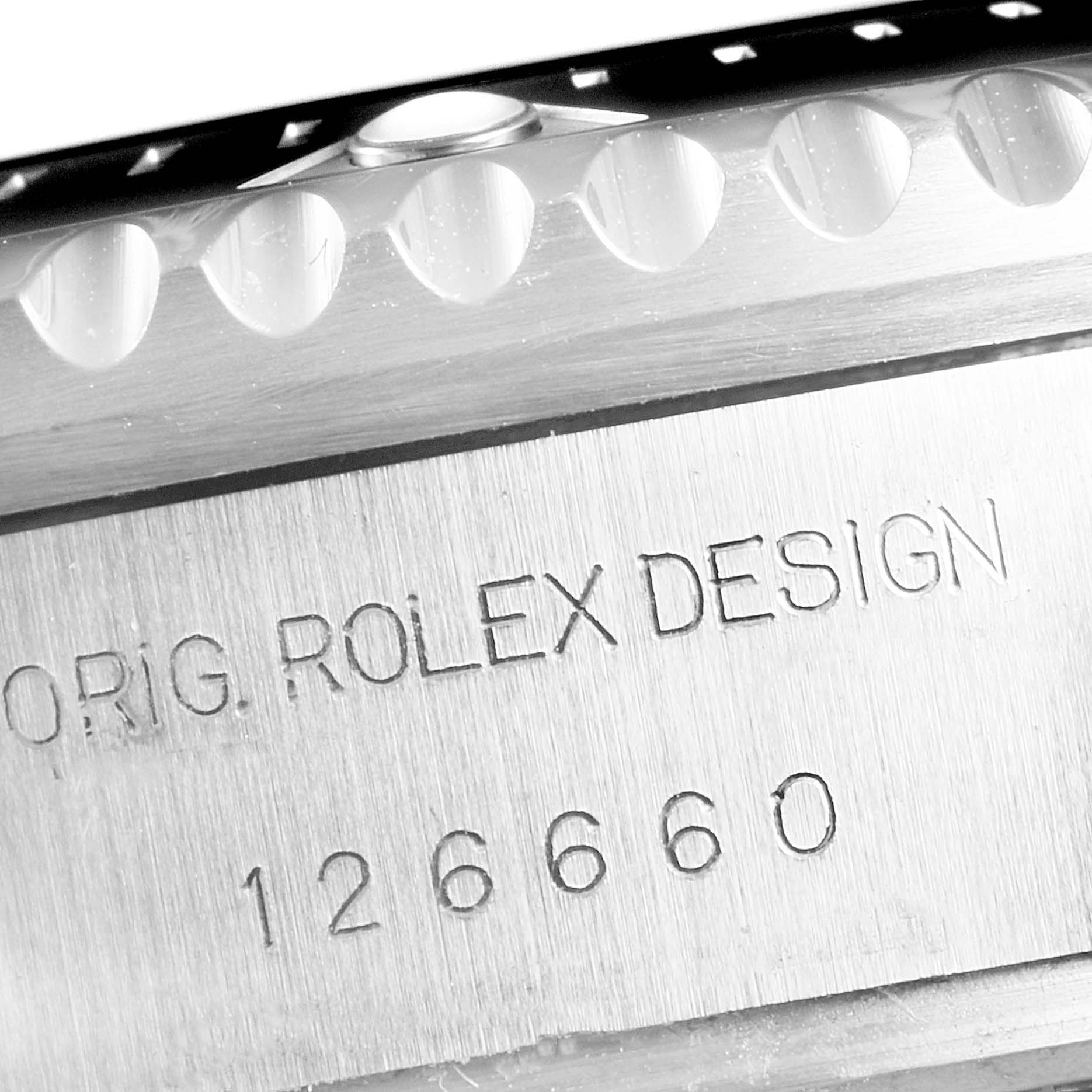 The image shows a close-up of the case side of the Rolex Sea-Dweller 126660 Men
s Stainless Steel Black Dial 126660 Men
s Stainless Steel Black Dial watch, highlighting the model number and inscription.