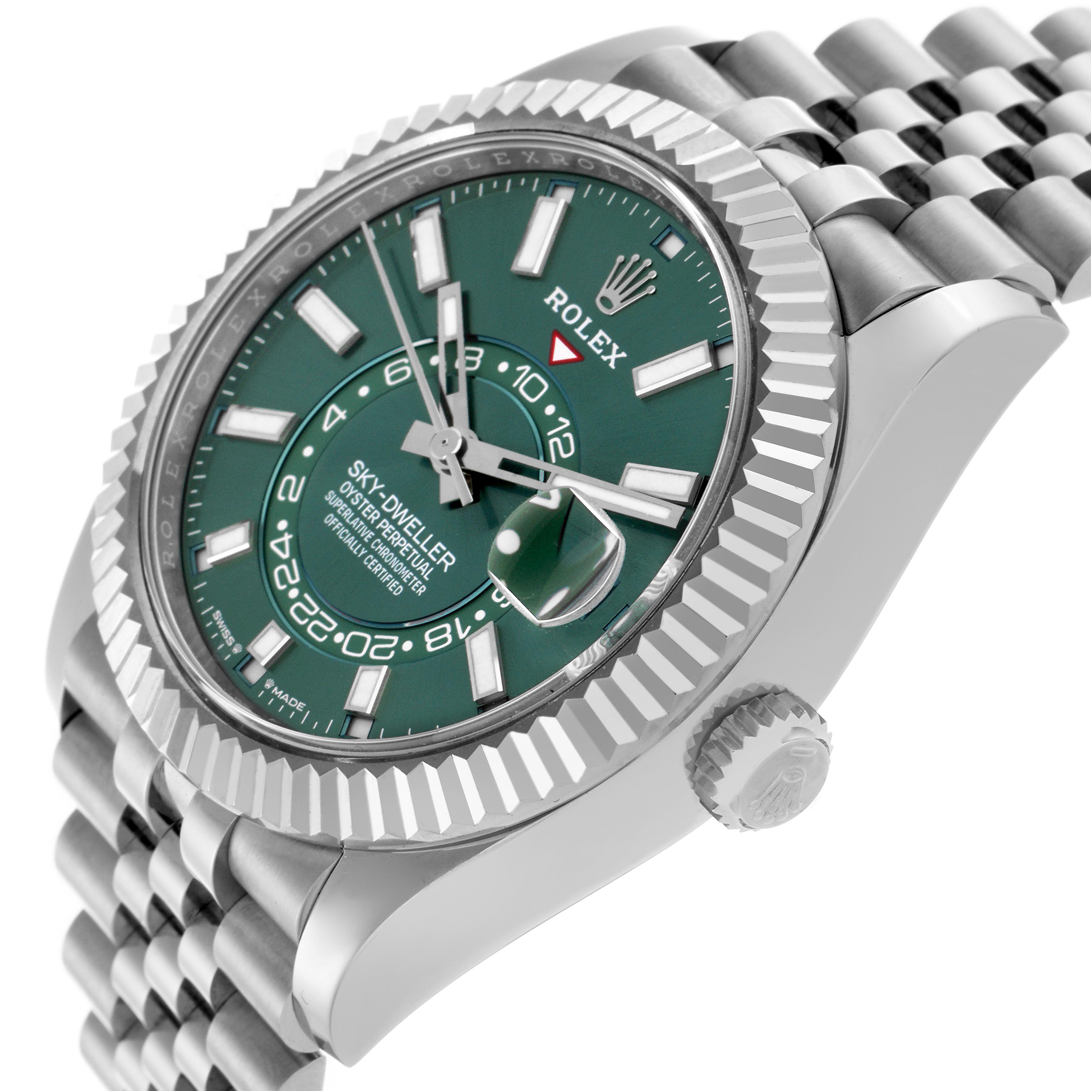 The Rolex Sky-Dweller 336934 Men's Stainless Steel Green Dial watch is shown at an angled side view, displaying the face, bezel, crown, and part of the bracelet.