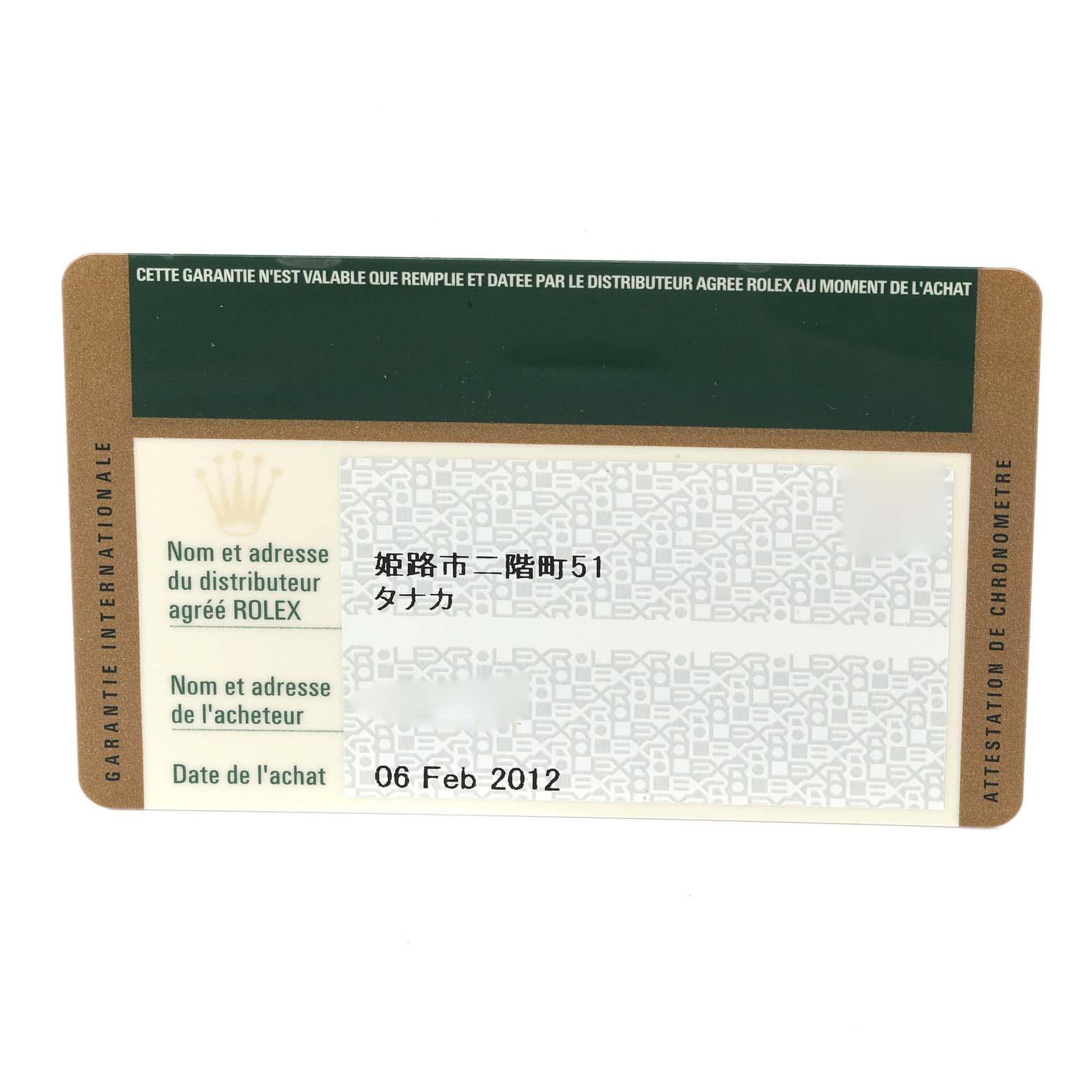 This image shows the warranty card for the Rolex Submariner 14060M Men
s Stainless Steel Black Dial 14060M Men
s Stainless Steel Black Dial, viewed from the front.