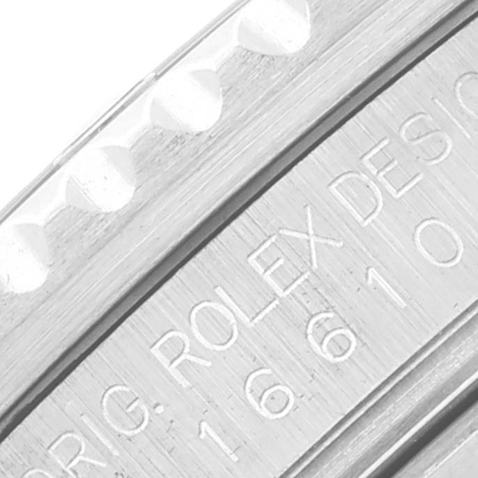 The close-up image shows the engraved side of the bezel and case of a Rolex Submariner 16610 Men
s Stainless Steel Black Dial 16610 Men
s Stainless Steel Black Dial watch.