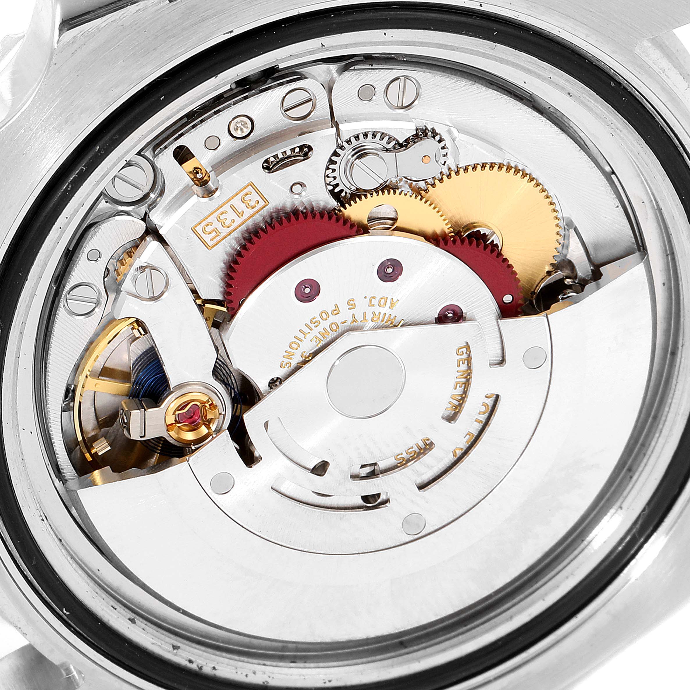 The image shows the movement, gears, and inner mechanism of a Rolex Submariner 116610LV Men
s Stainless Steel Green Dial 116610LV Men
s Stainless Steel Green Dial watch, viewed from the back case.