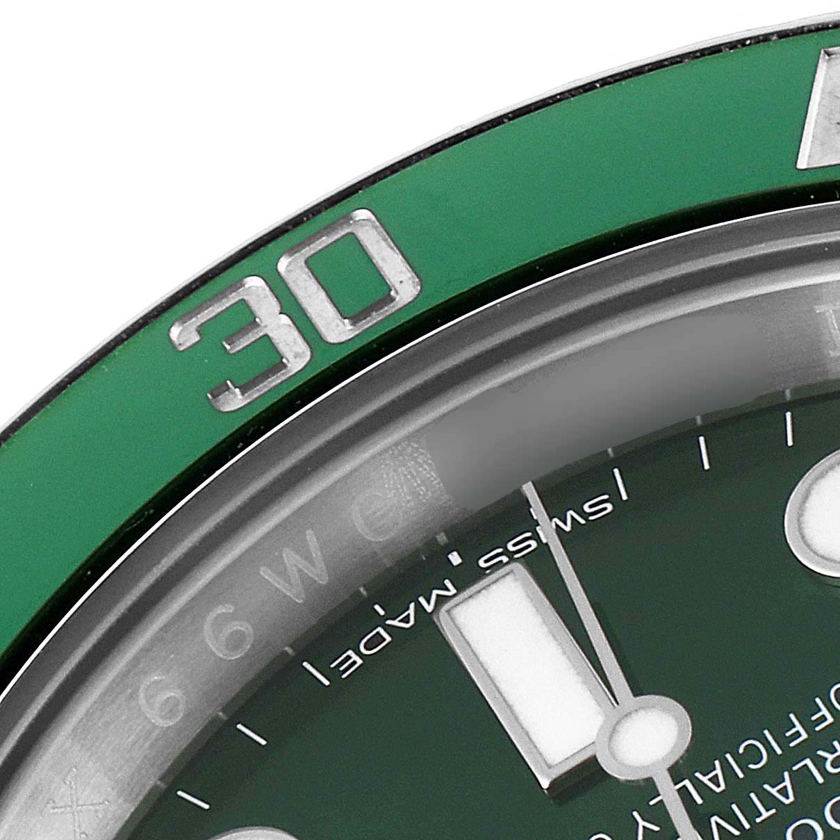 The image shows a close-up of the green bezel, dial, and minute marker of a Rolex Submariner 116610LV Men
s Stainless Steel Green Dial 116610LV Men
s Stainless Steel Green Dial watch.