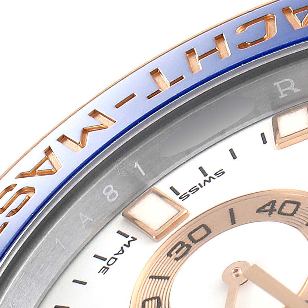 The close-up image shows part of the dial and bezel of a Rolex Yacht-Master 116681 Men
s Steel and Gold (two tone) White Dial 116681 Men
s Steel and Gold (two tone) White Dial watch.