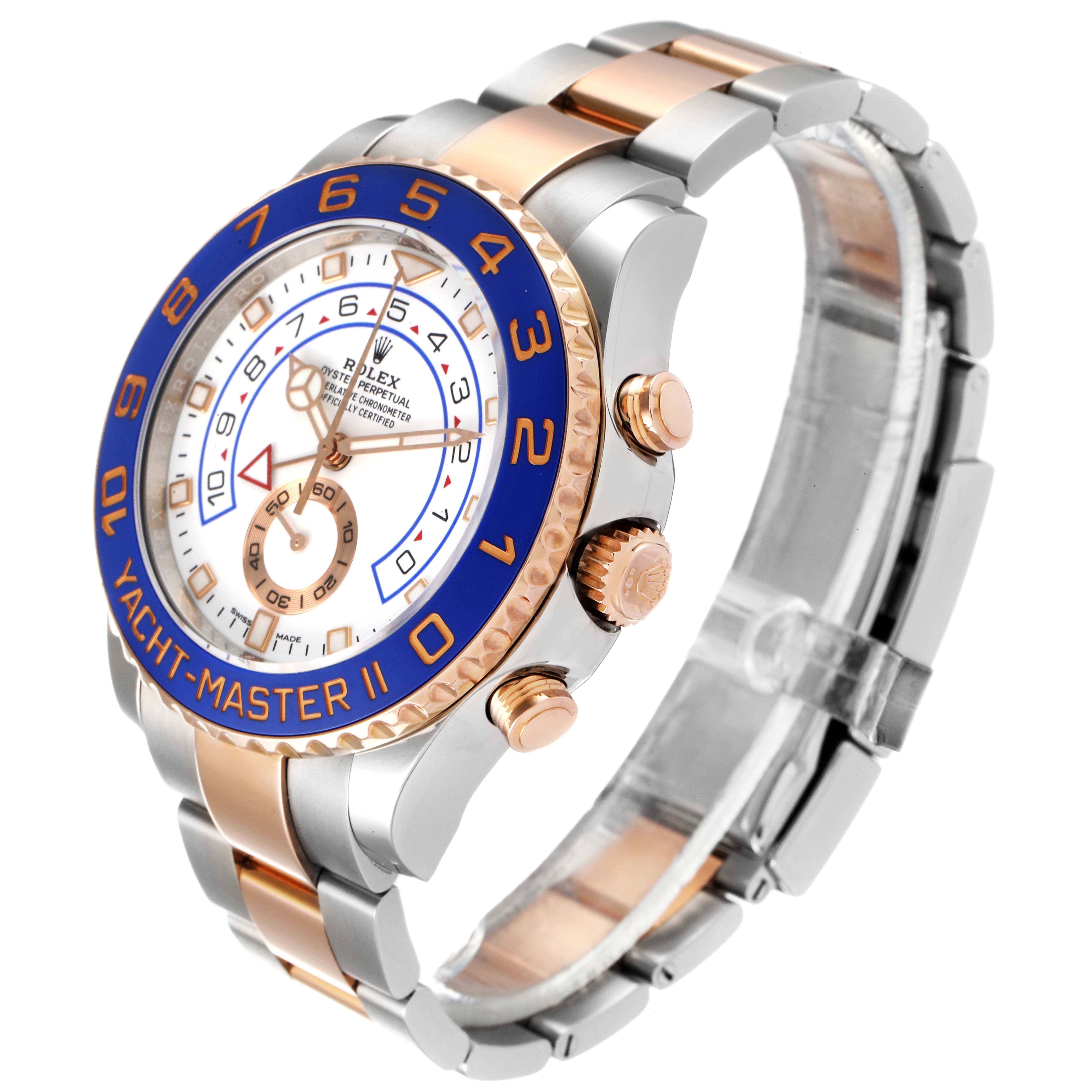 The Rolex Yacht-Master 116681 Men
s Steel and Gold (two tone) White Dial 116681 Men
s Steel and Gold (two tone) White Dial watch is shown at an angle highlighting the face, bezel, crown, and bracelet.
