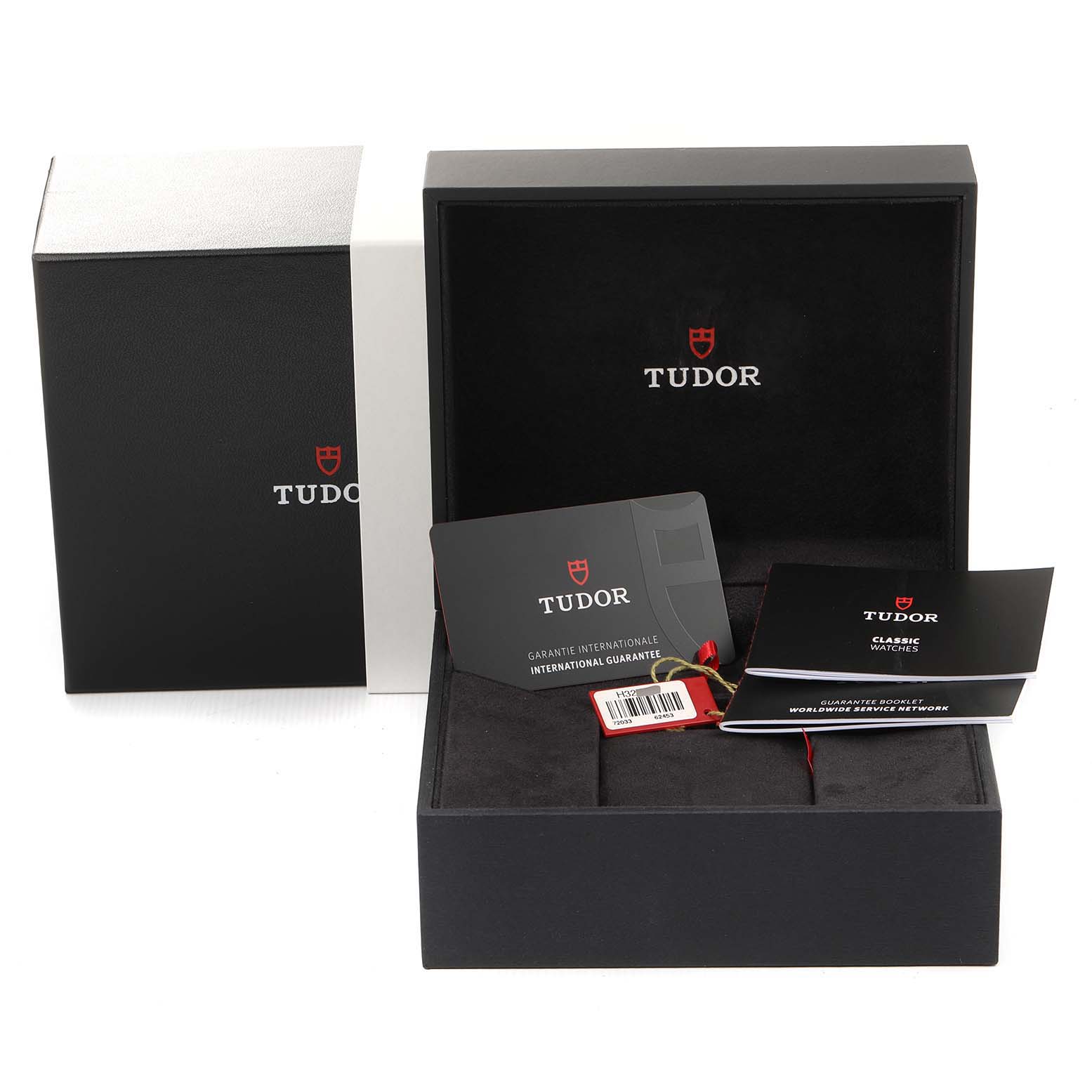 This image shows the packaging, warranty card, and booklets for the Tudor Prince 72033 Women's Steel and Gold (two tone) Champagne Dial 72033 Women's Steel and Gold (two tone) Champagne Dial model watch.