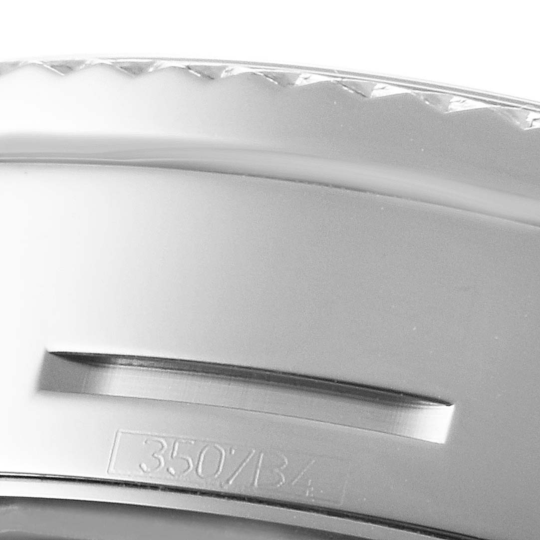 This image shows a close-up of the bezel and part of the casing of a Breitling Bentley P19362 Men's Stainless Steel Mother of Pearl Dial P19362 Men's Stainless Steel Mother of Pearl Dial watch.