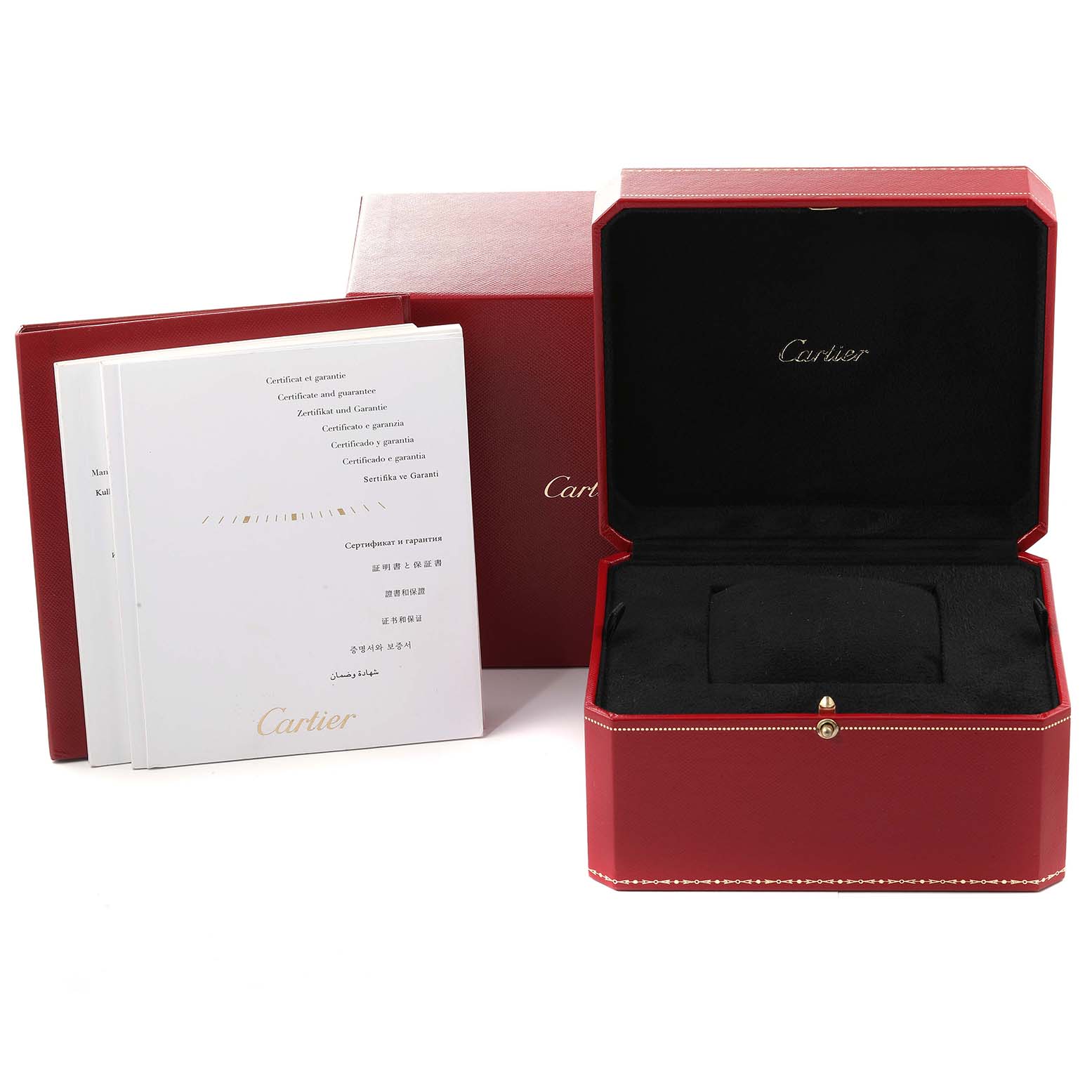 The image shows the open box and documents of the Calibre de Cartier model by Cartier, showcasing the packaging and warranty papers.