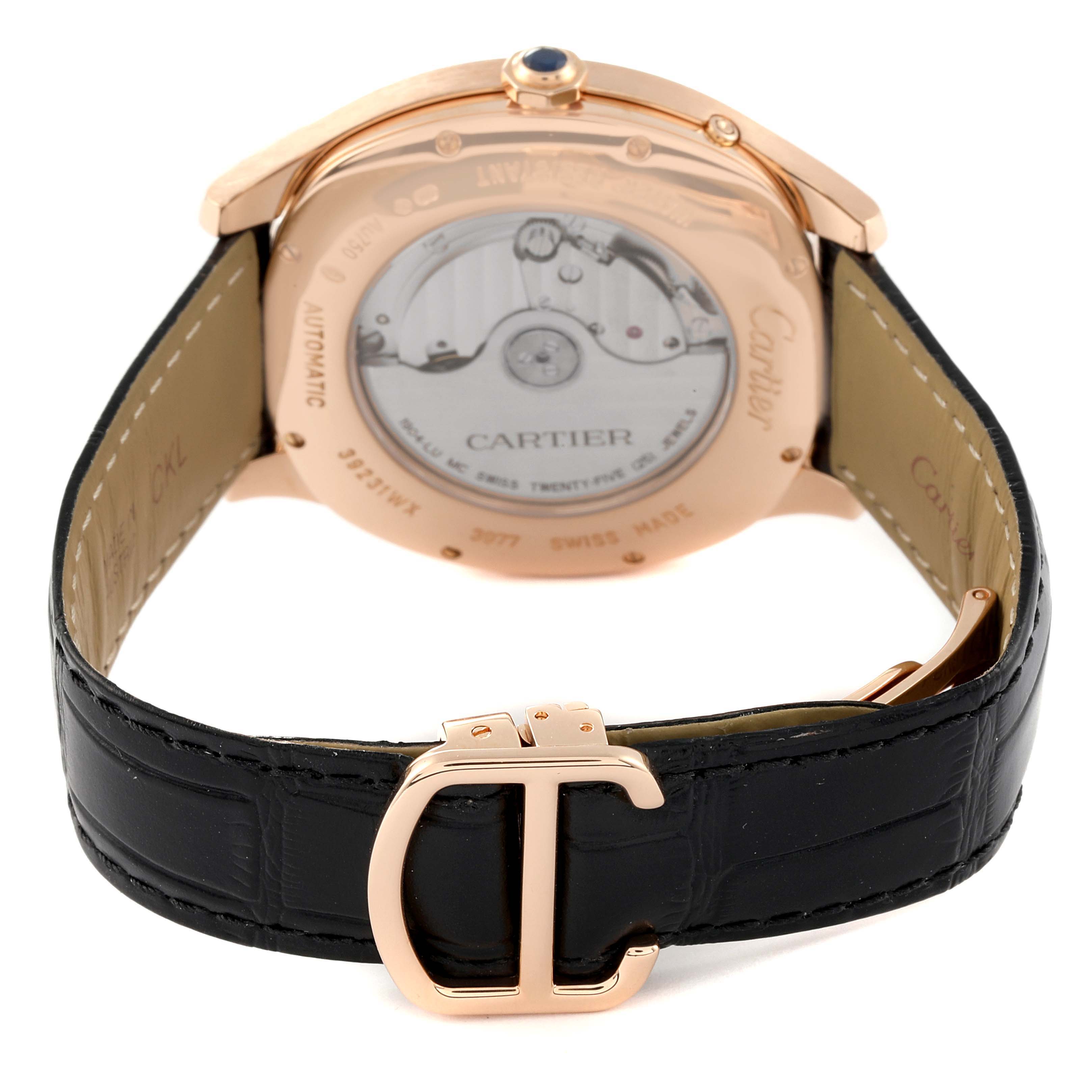 The image shows the back side of the Drive de Cartier watch by Cartier, displaying the watch case, movement, and leather strap with a Cartier "C" clasp.
