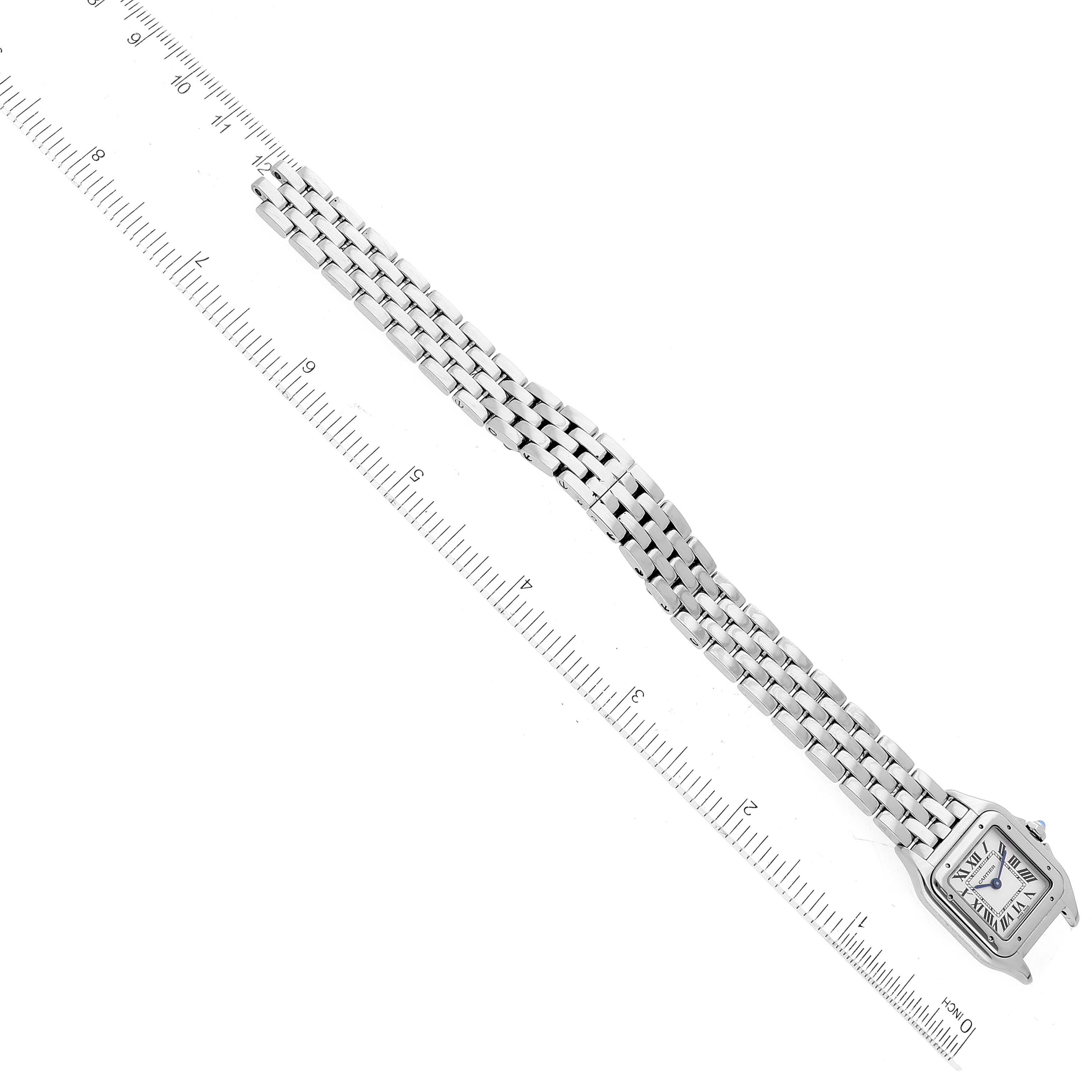 The image shows the full length of a Cartier Panthere WSPN0006 Women's Stainless Steel Silver Dial WSPN0006 Women's Stainless Steel Silver Dial model watch laid flat with a ruler for scale.