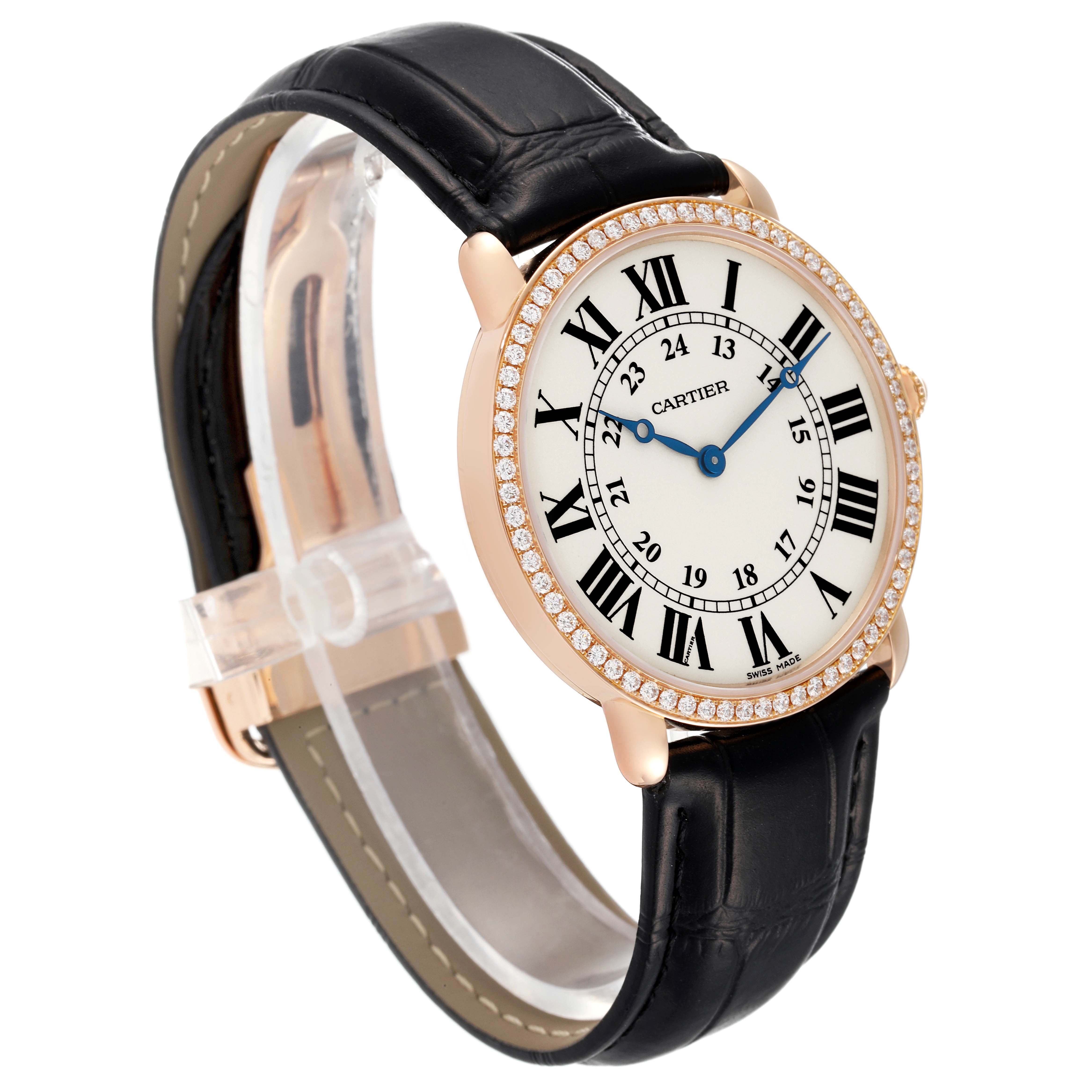 The Cartier Tank Louis WR000651 Women's Rose Gold Silver Dial watch is shown at an angled side view, highlighting the face, bezel, and leather strap.