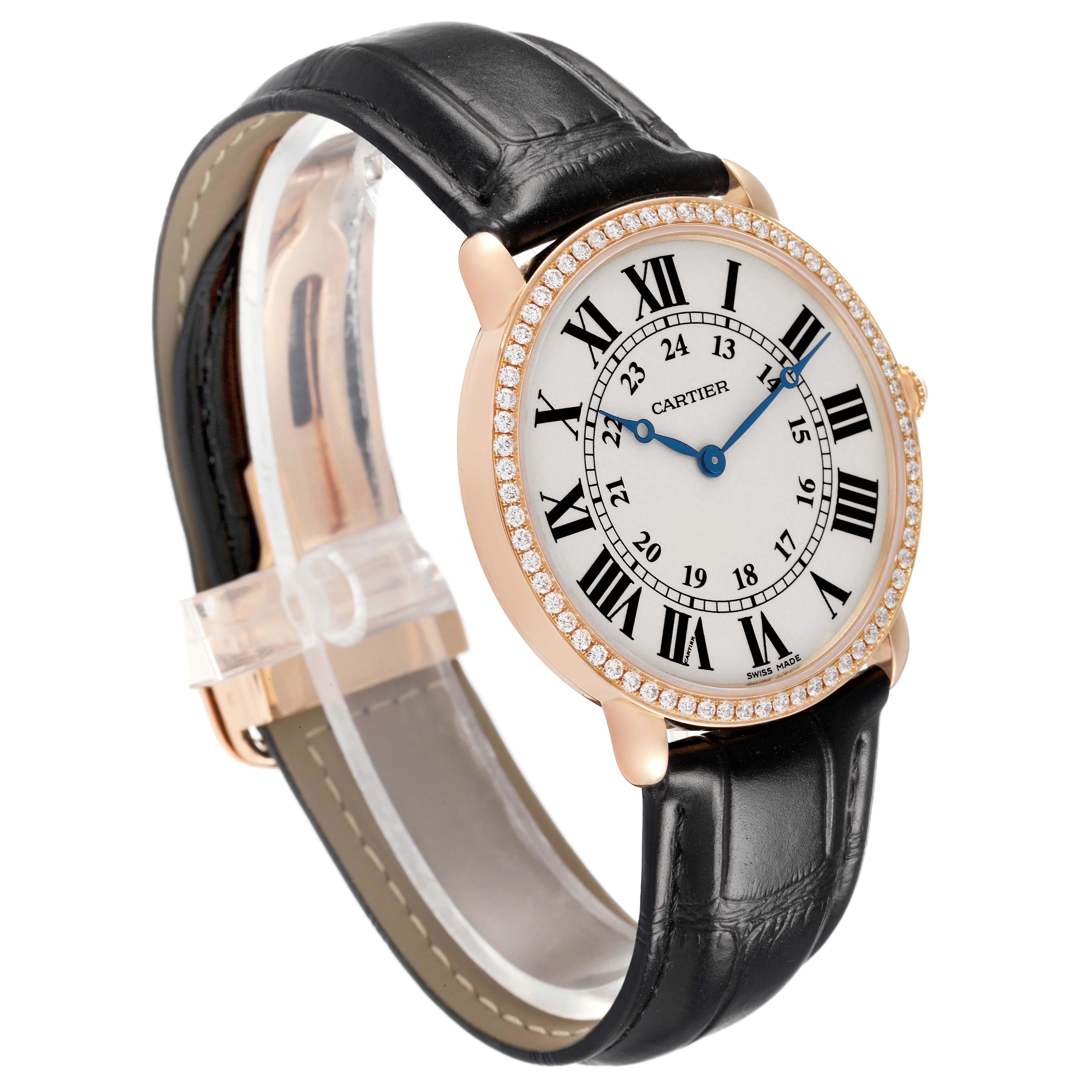 The image shows a Cartier Tank Louis WR000651 Women's Rose Gold Silver Dial watch at a three-quarter angle, highlighting the face, black strap, and diamond-studded bezel.