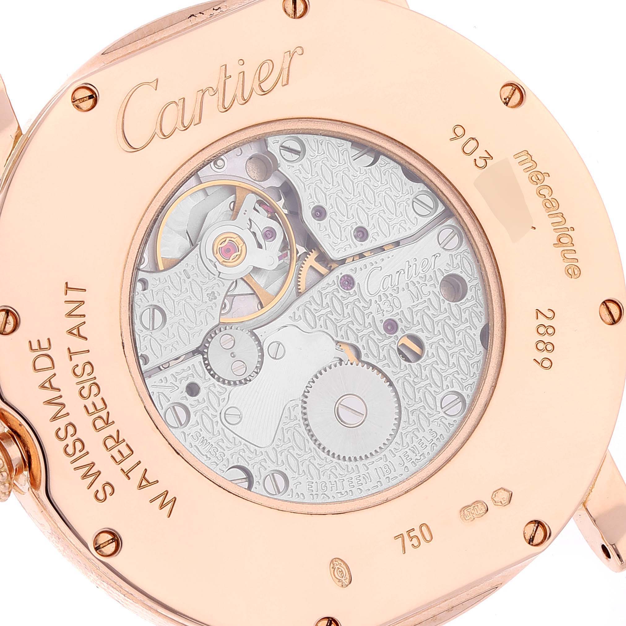 This is a close-up shot of the back of a Cartier Ronde WR000651 Men
s Rose Gold Silver Dial WR000651 Men
s Rose Gold Silver Dial watch, showcasing its mechanical movement and engravings.